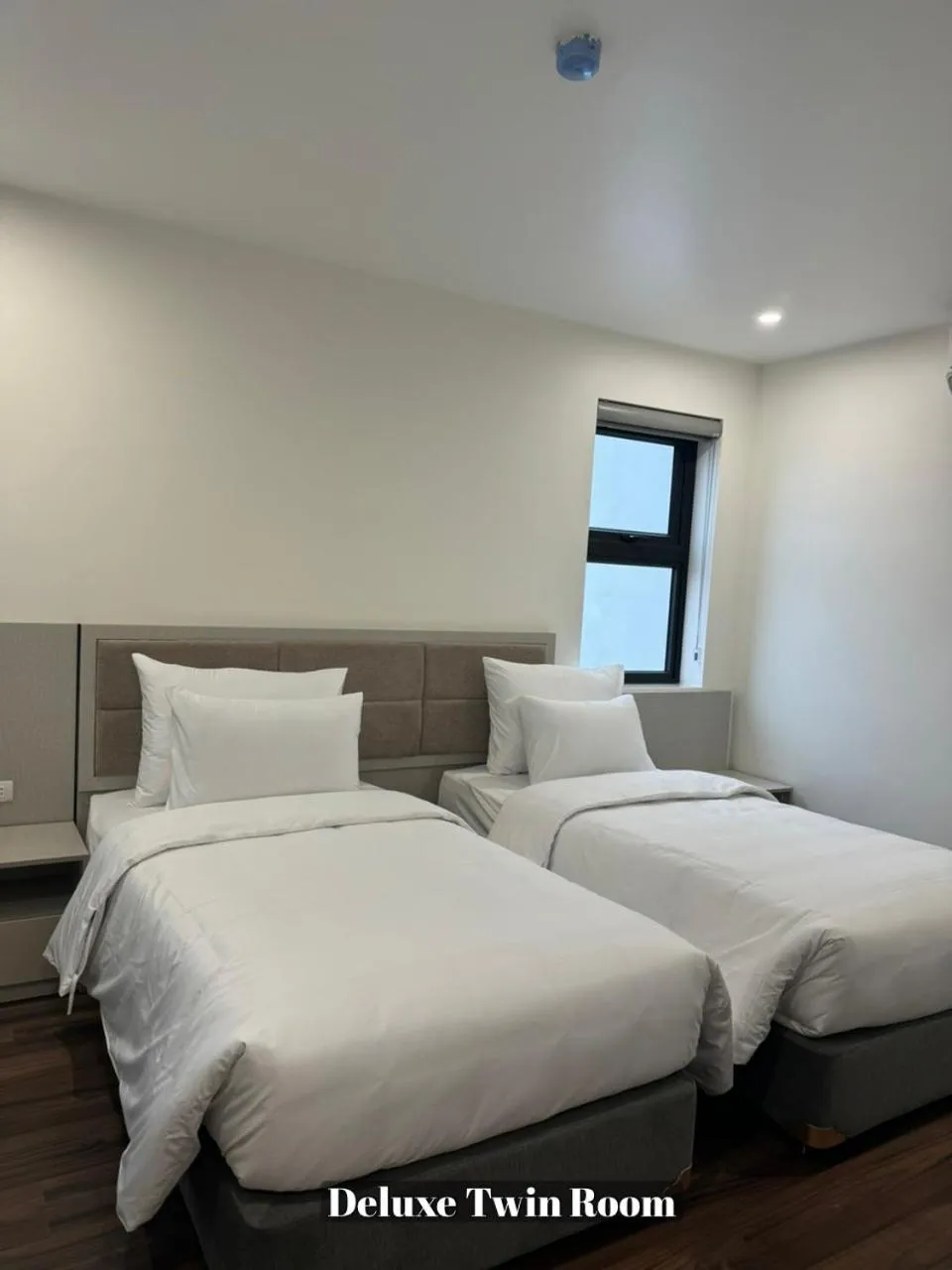 Bed in Grand Dragon Noi Bai Hotel