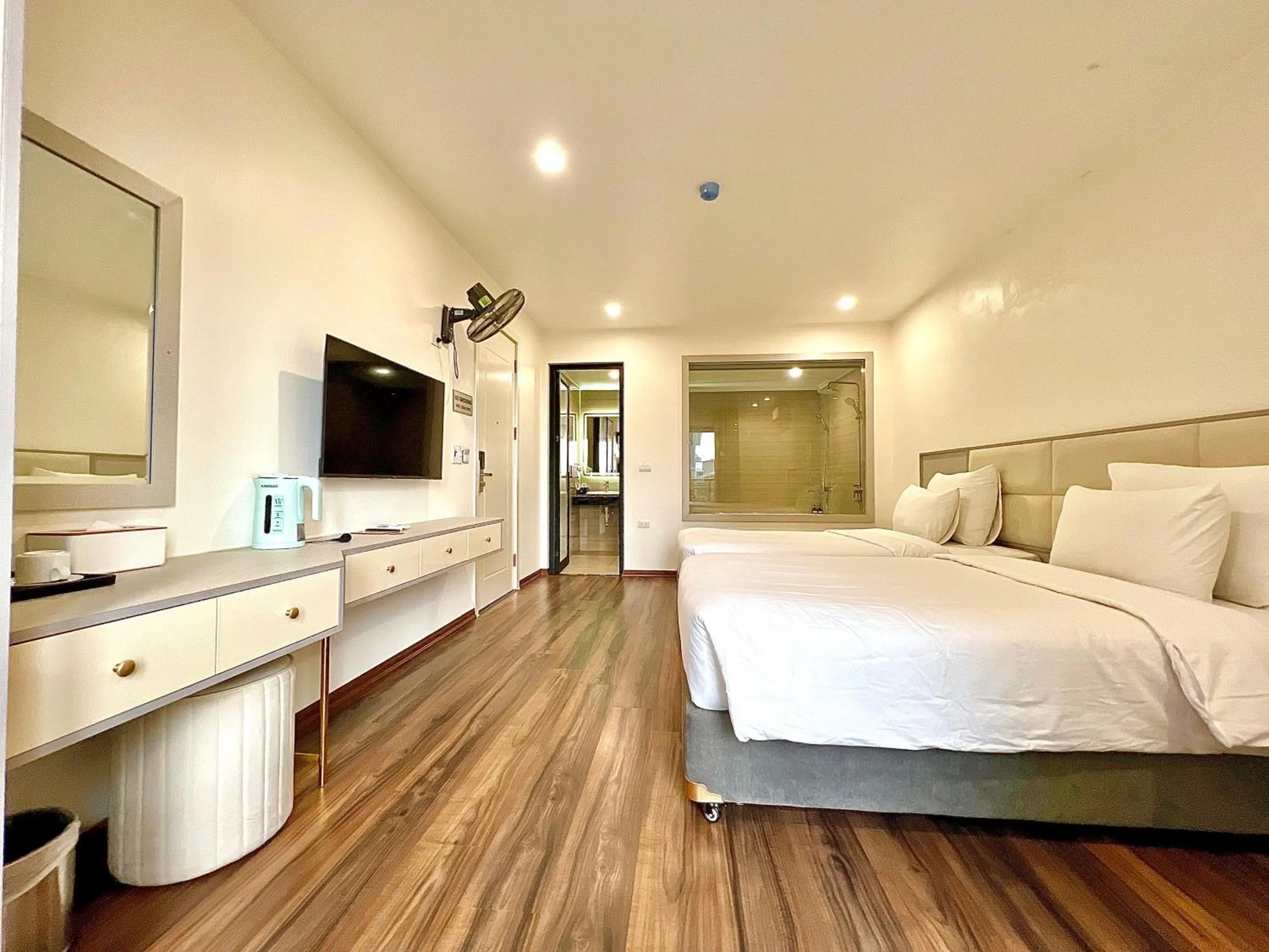 Bed in Grand Dragon Noi Bai Hotel