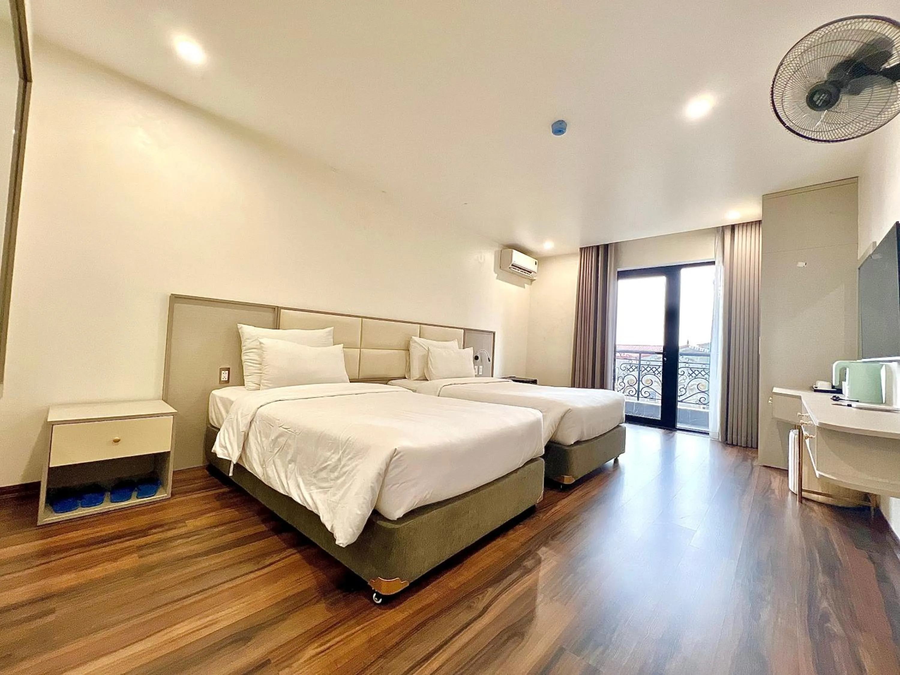 Bed in Grand Dragon Noi Bai Hotel