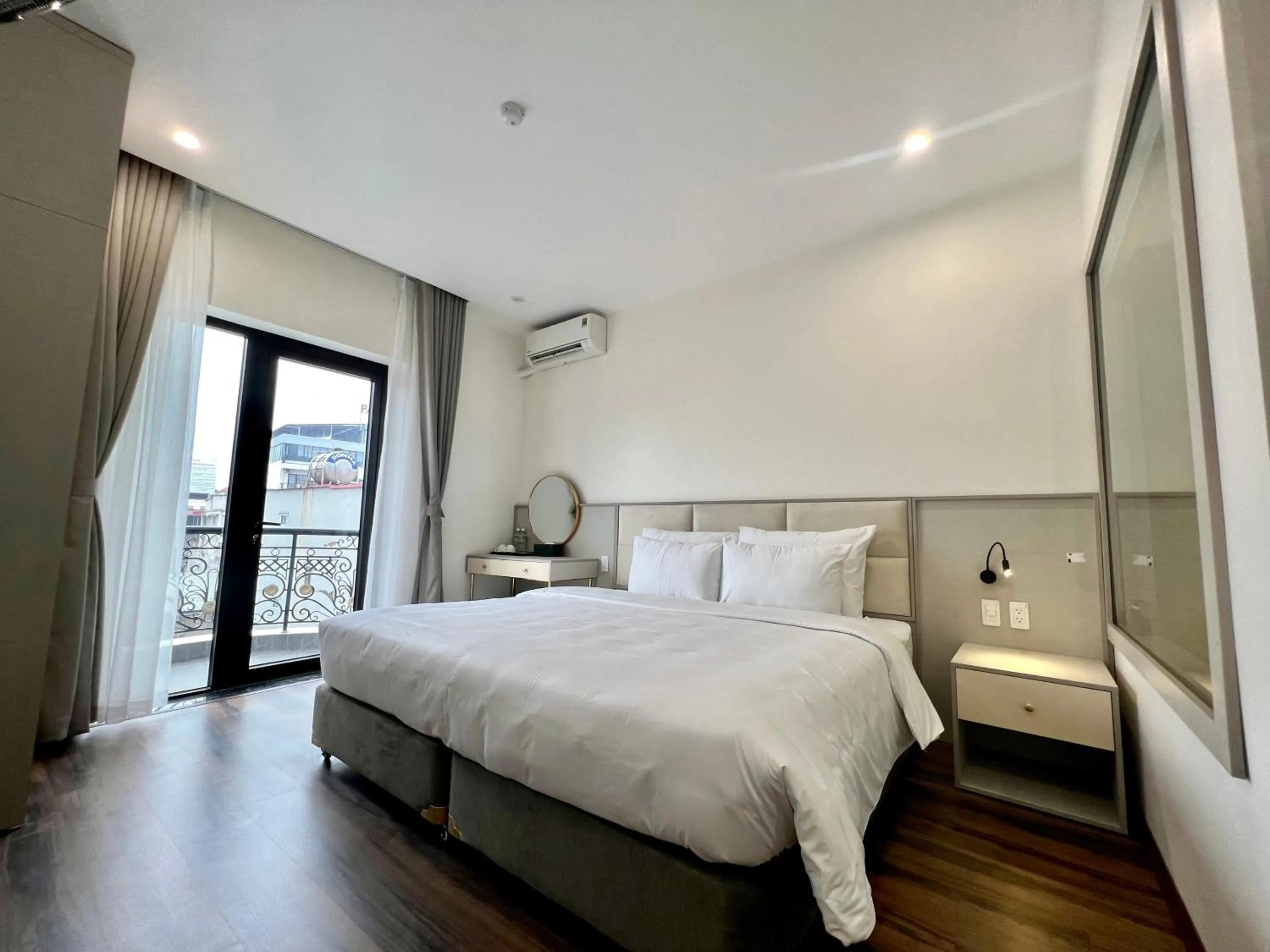 Bed in Grand Dragon Noi Bai Hotel