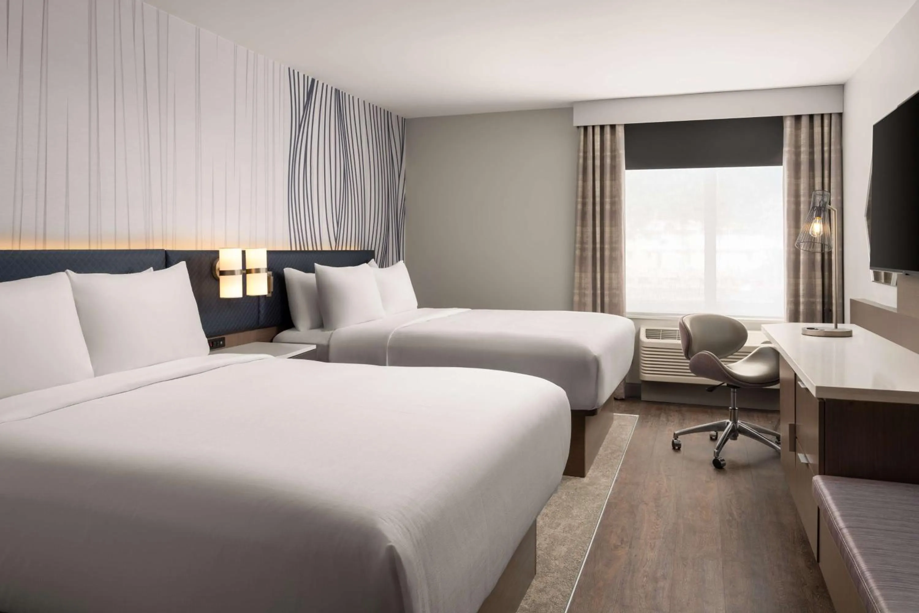 Bed in Hotel Lela Wilmington, Tapestry Collection By Hilton