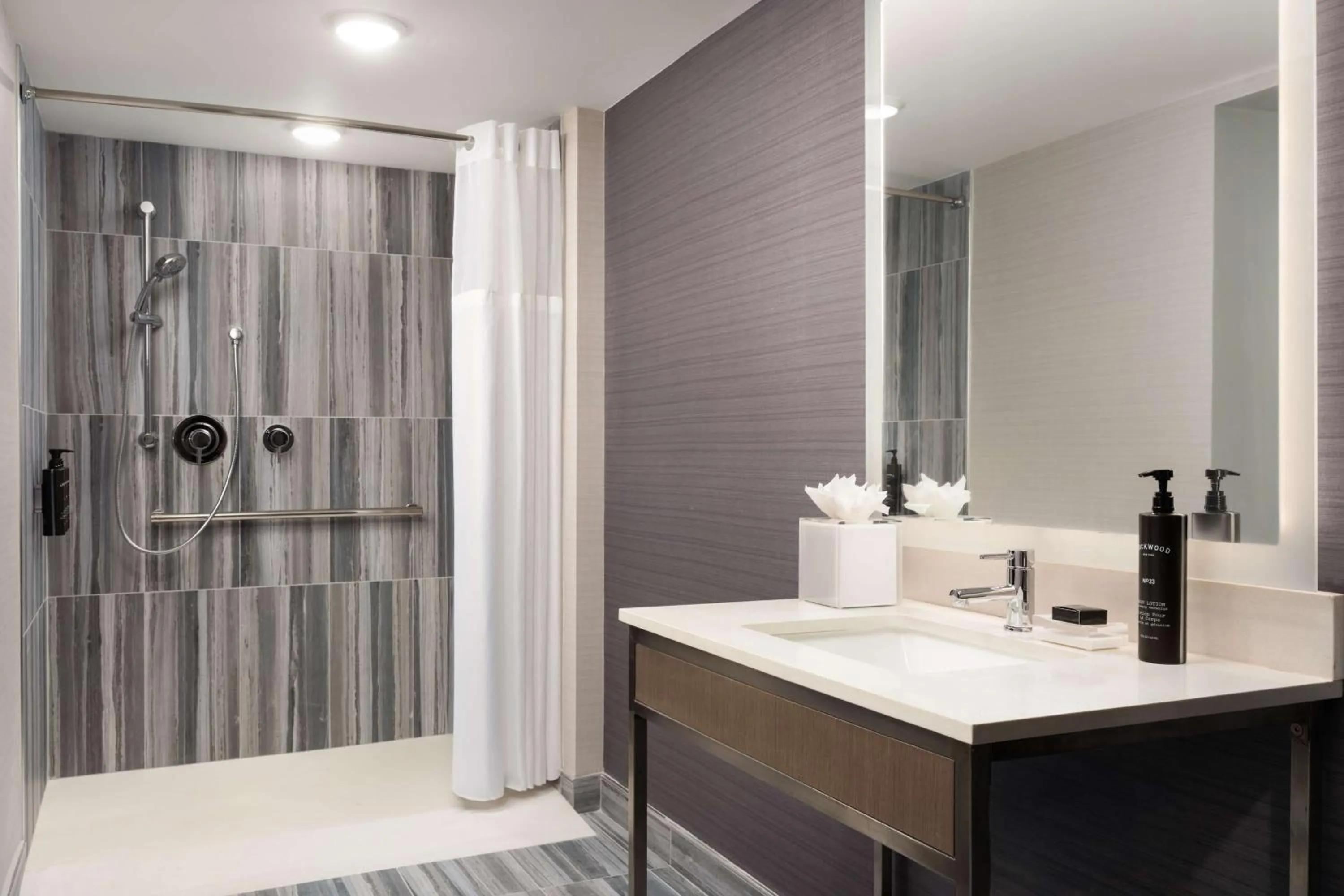 Bathroom in Hotel Lela Wilmington, Tapestry Collection By Hilton