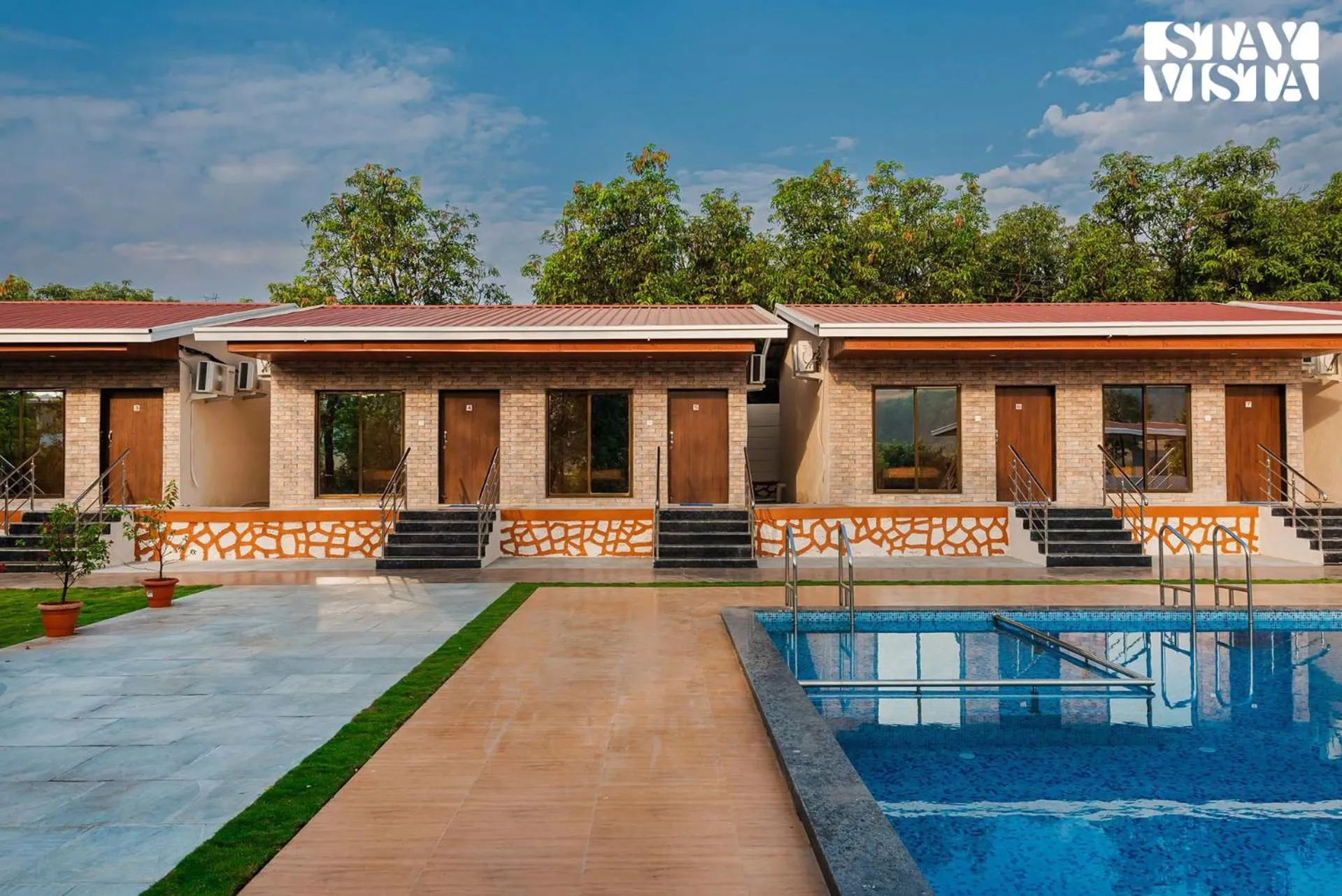 Swimming pool in Mango Splash by VEO - Part of StayVista