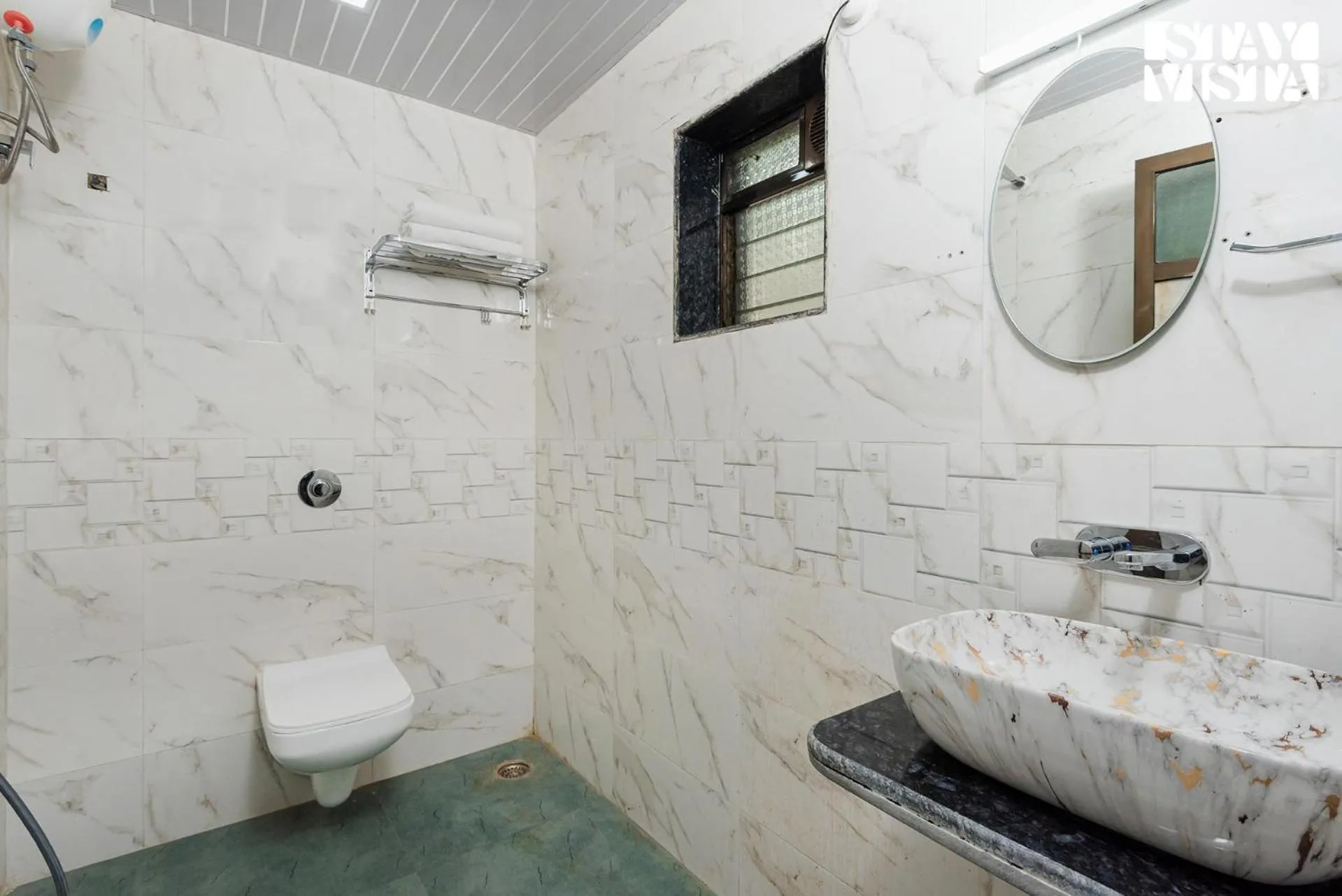 Bathroom in Mango Splash by VEO - Part of StayVista