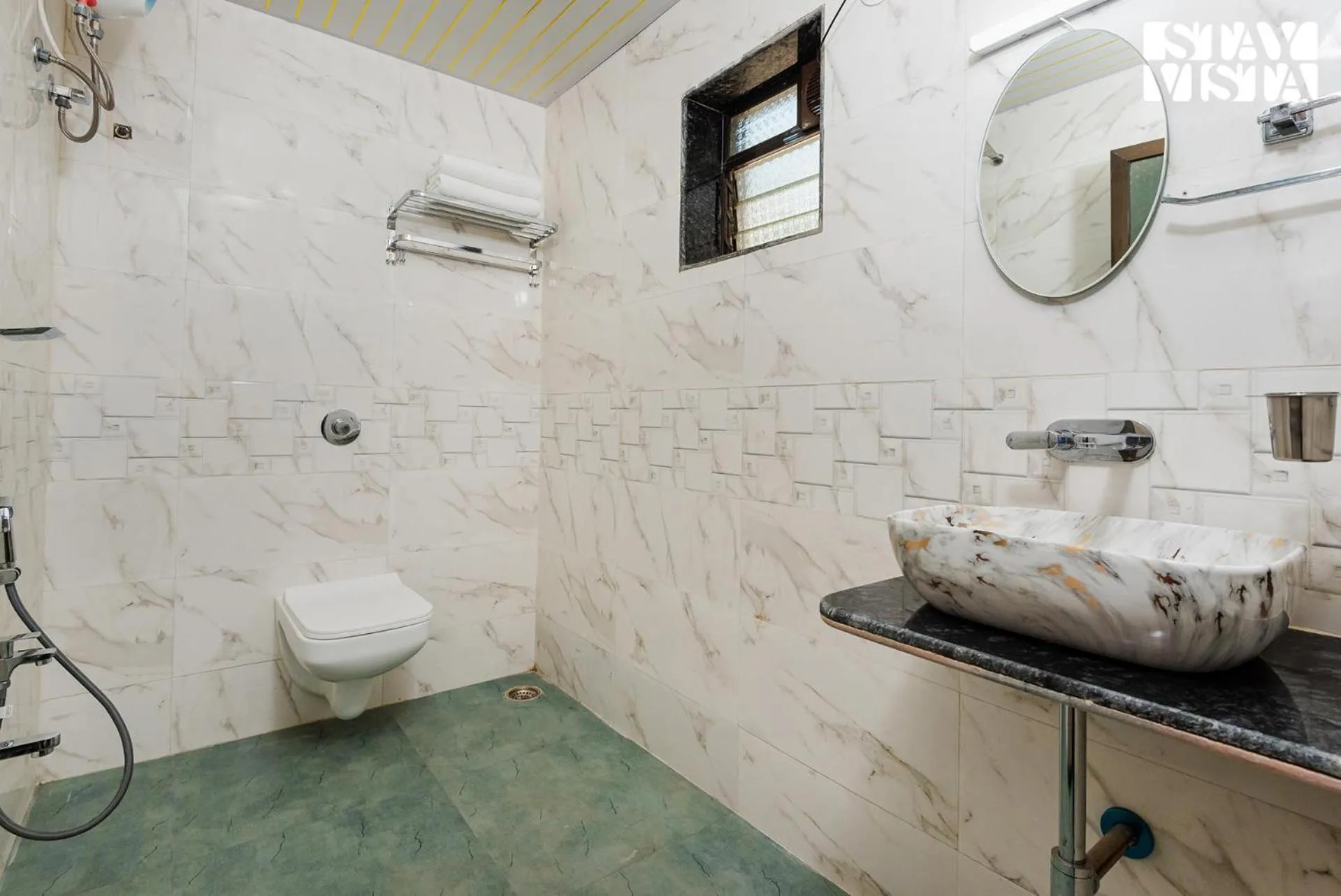 Bathroom in Mango Splash by VEO - Part of StayVista