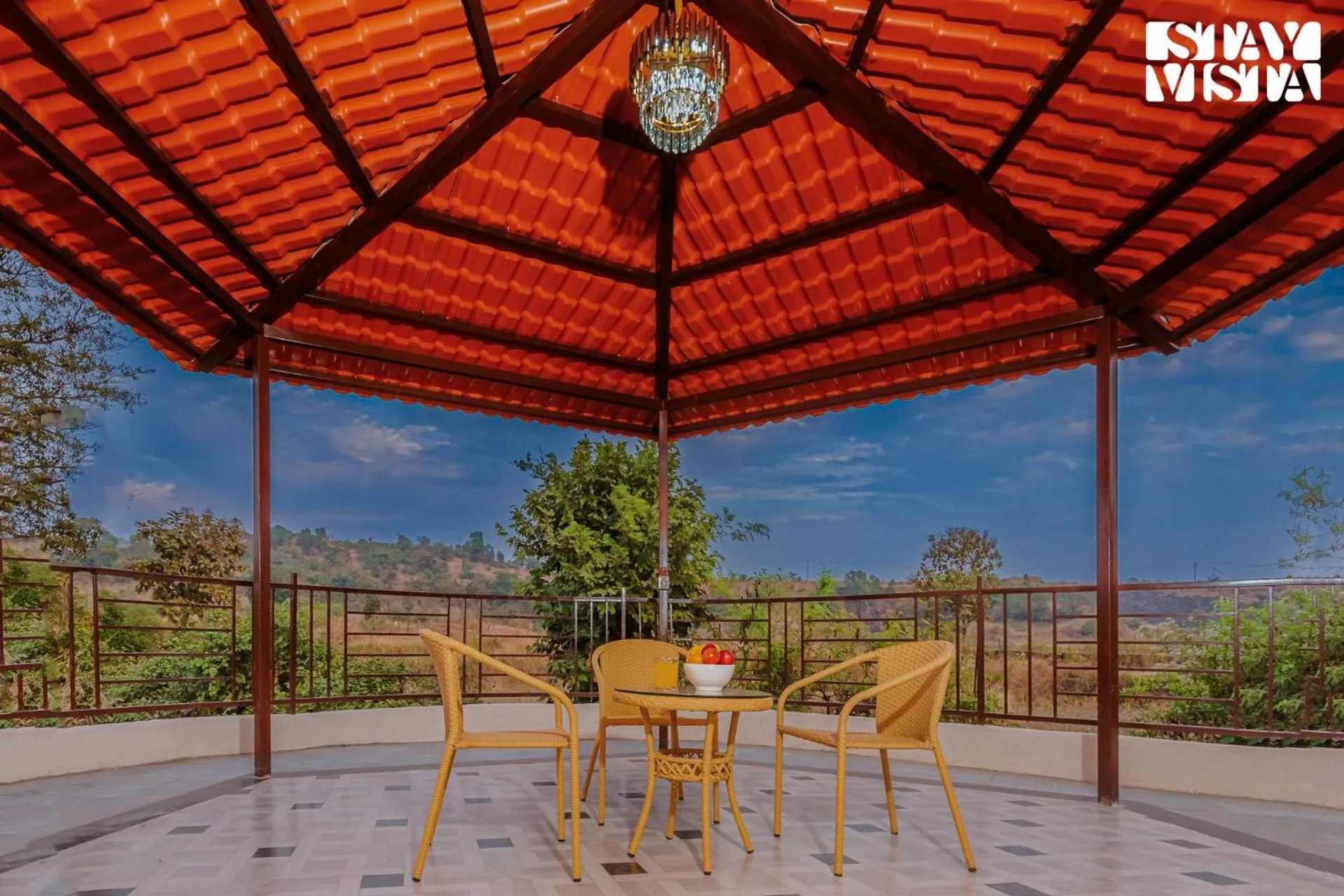 Seating area in Mango Splash by VEO - Part of StayVista