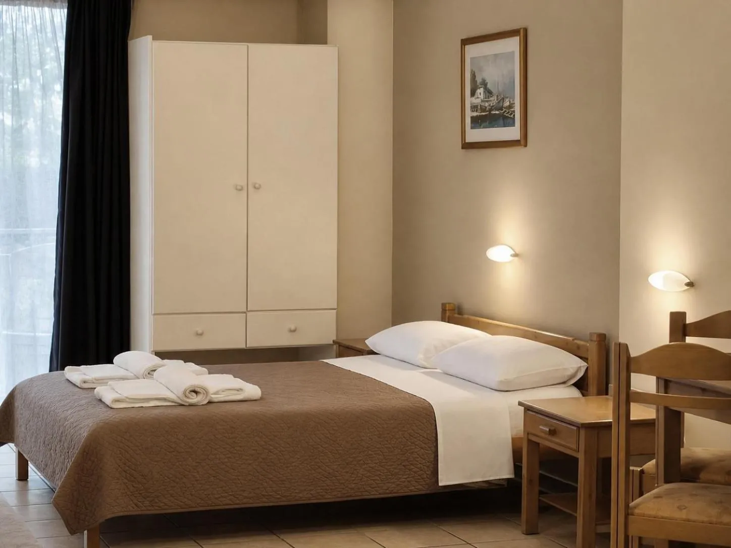 Bed in Varvaras Diamond Hotel