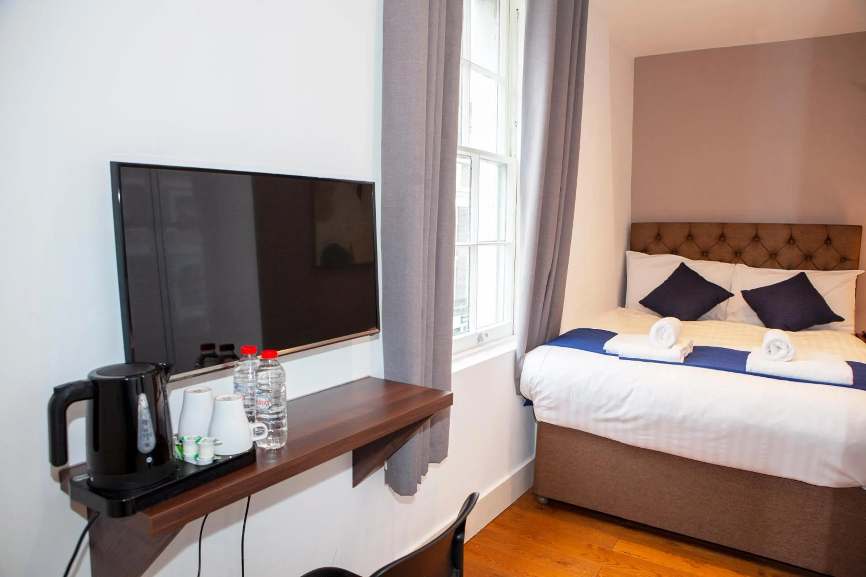 Bed in Putera Puteri Residence