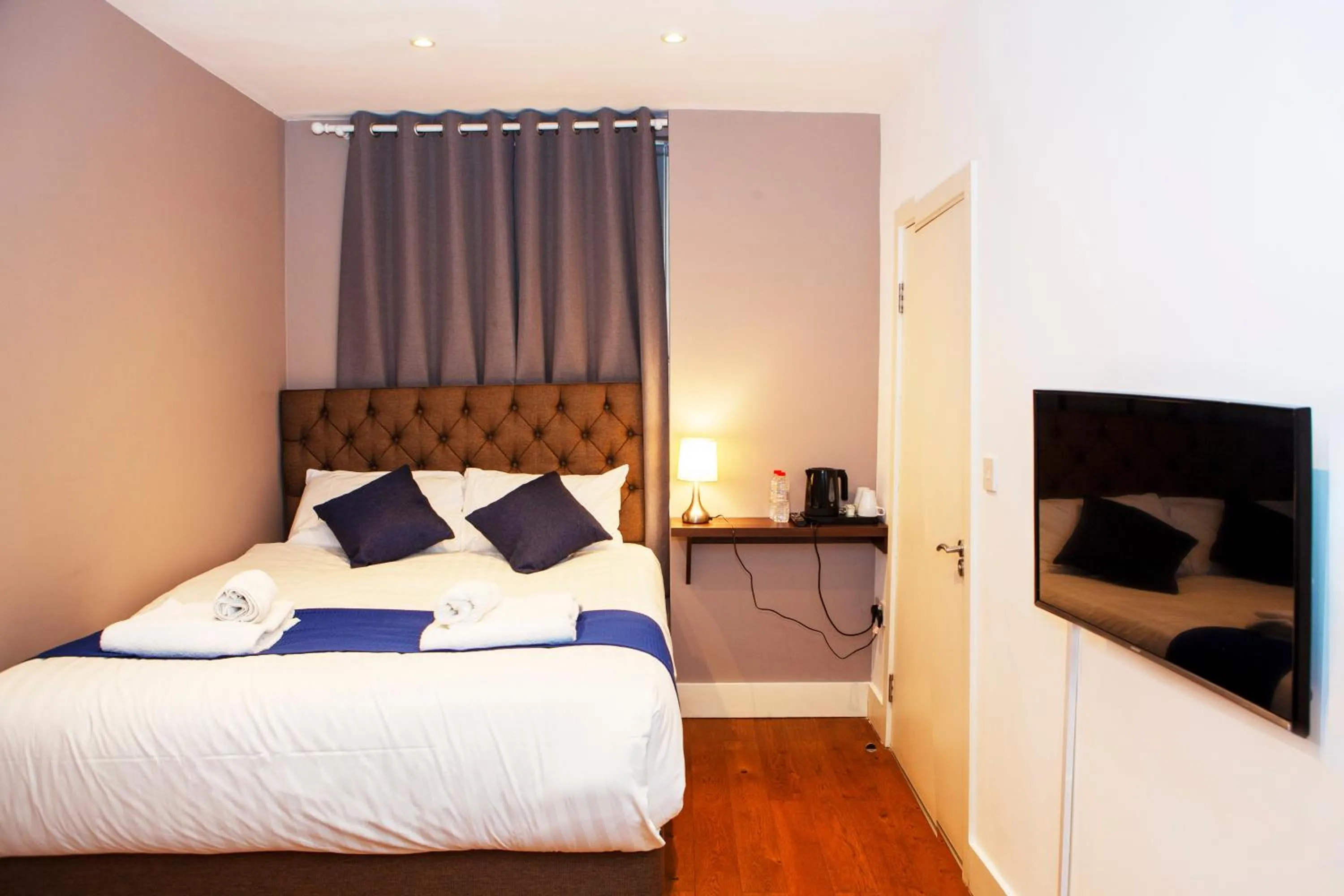 Bed in Putera Puteri Residence