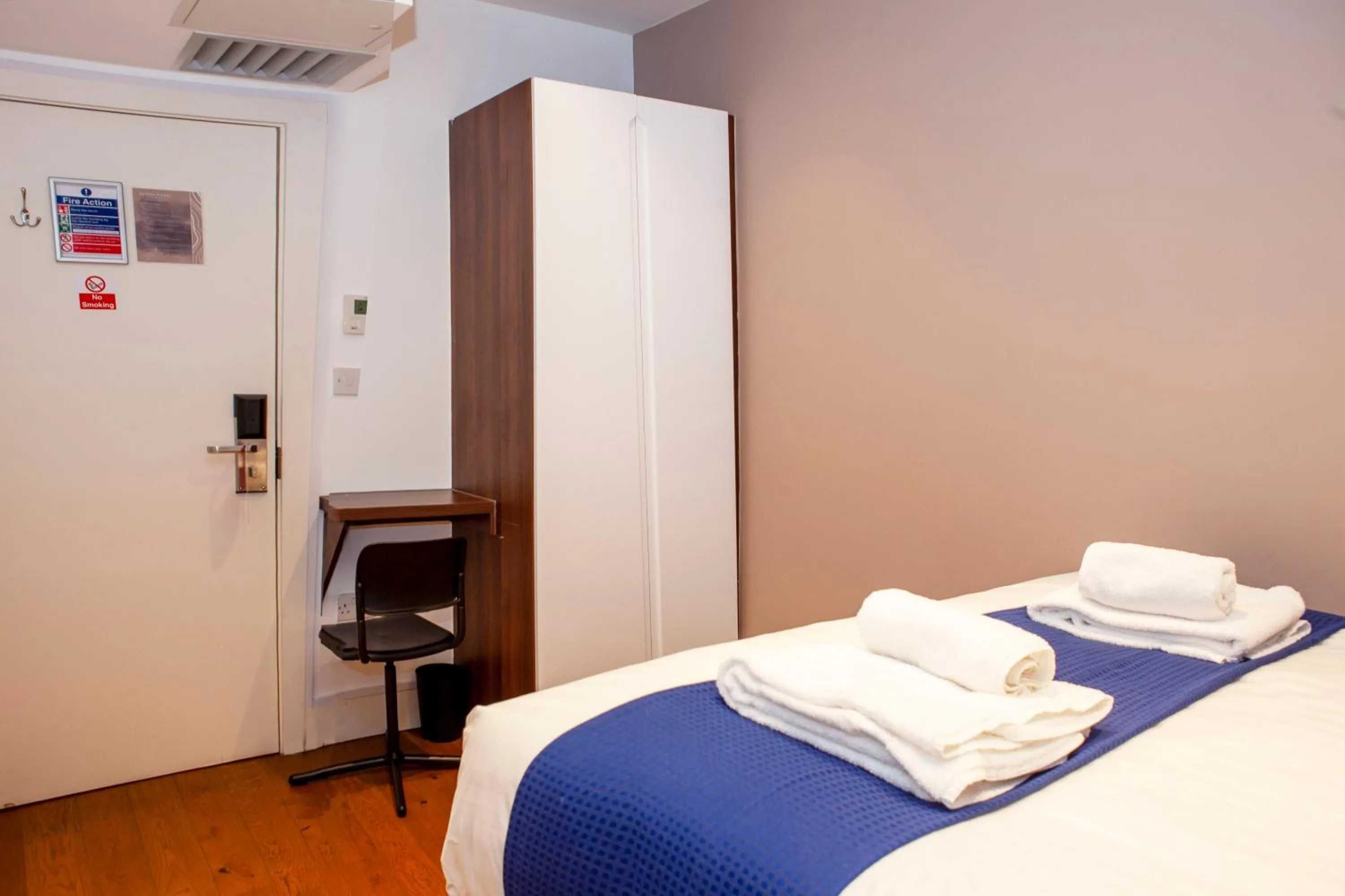 Bed in Putera Puteri Residence