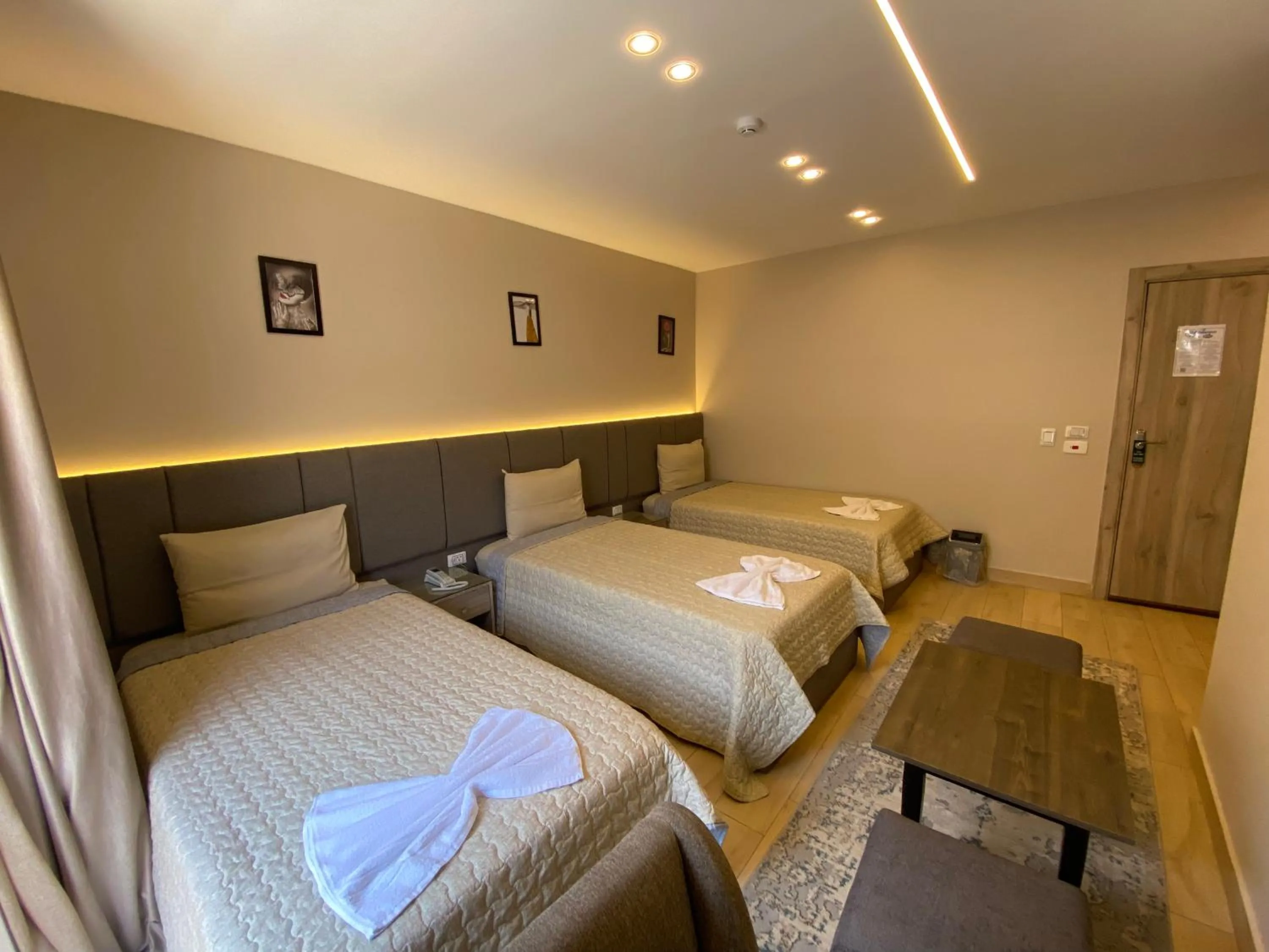 Deluxe Triple Room with Balcony in Holy Sheet Plus - Boutique Hotel