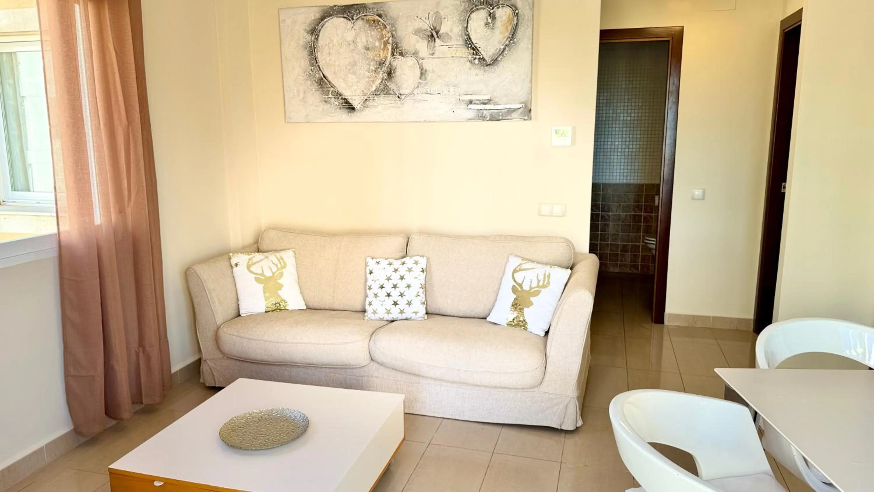 Living room in Apartamentos Carlton VyB