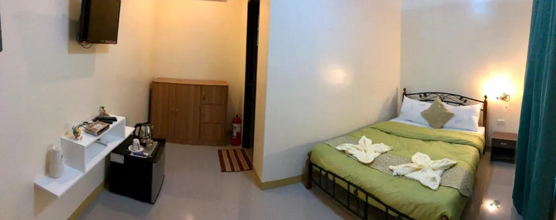 Bed in Kojie Guest House