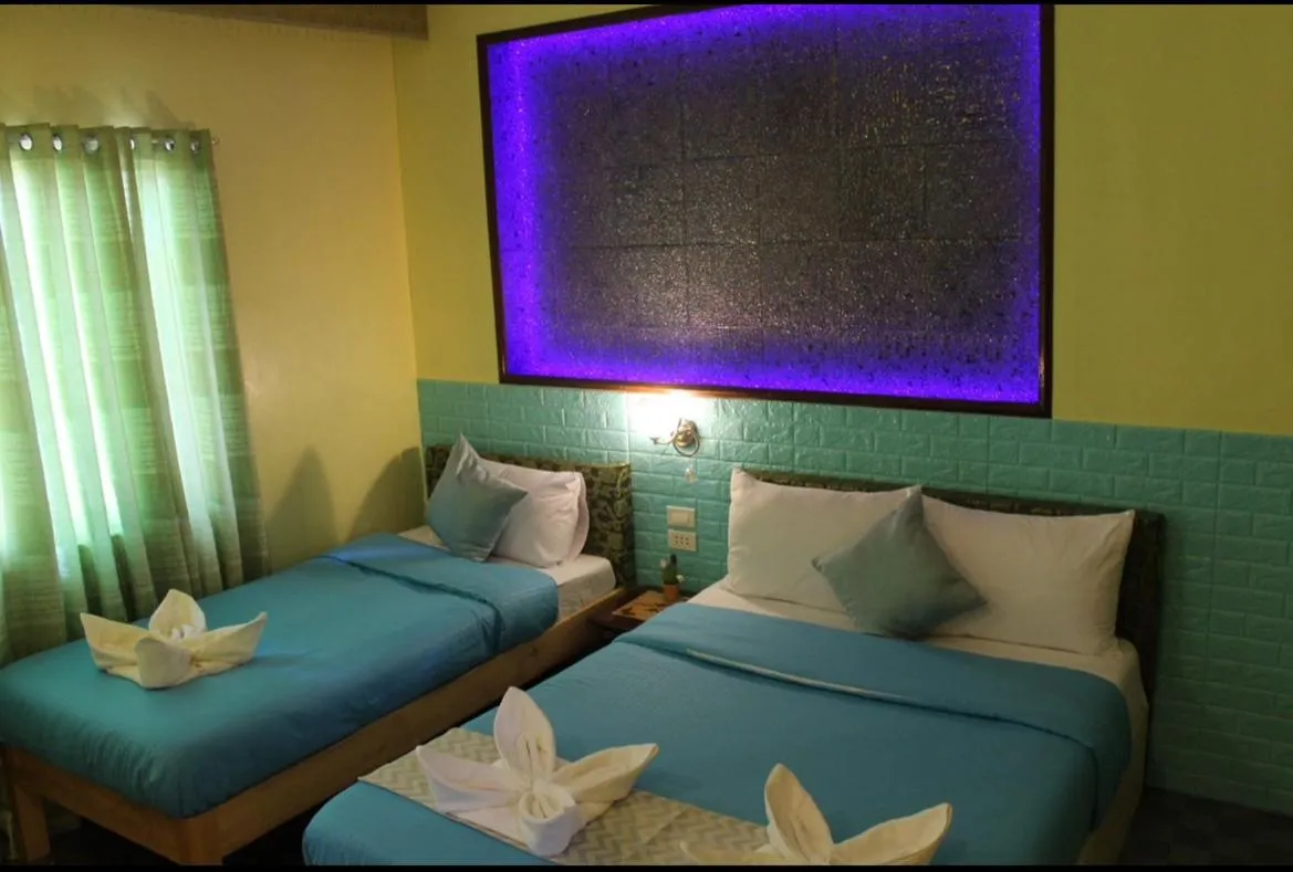 Bed in Kojie Guest House