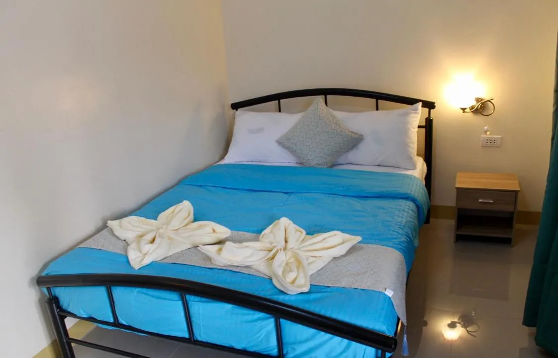 Bed in Kojie Guest House