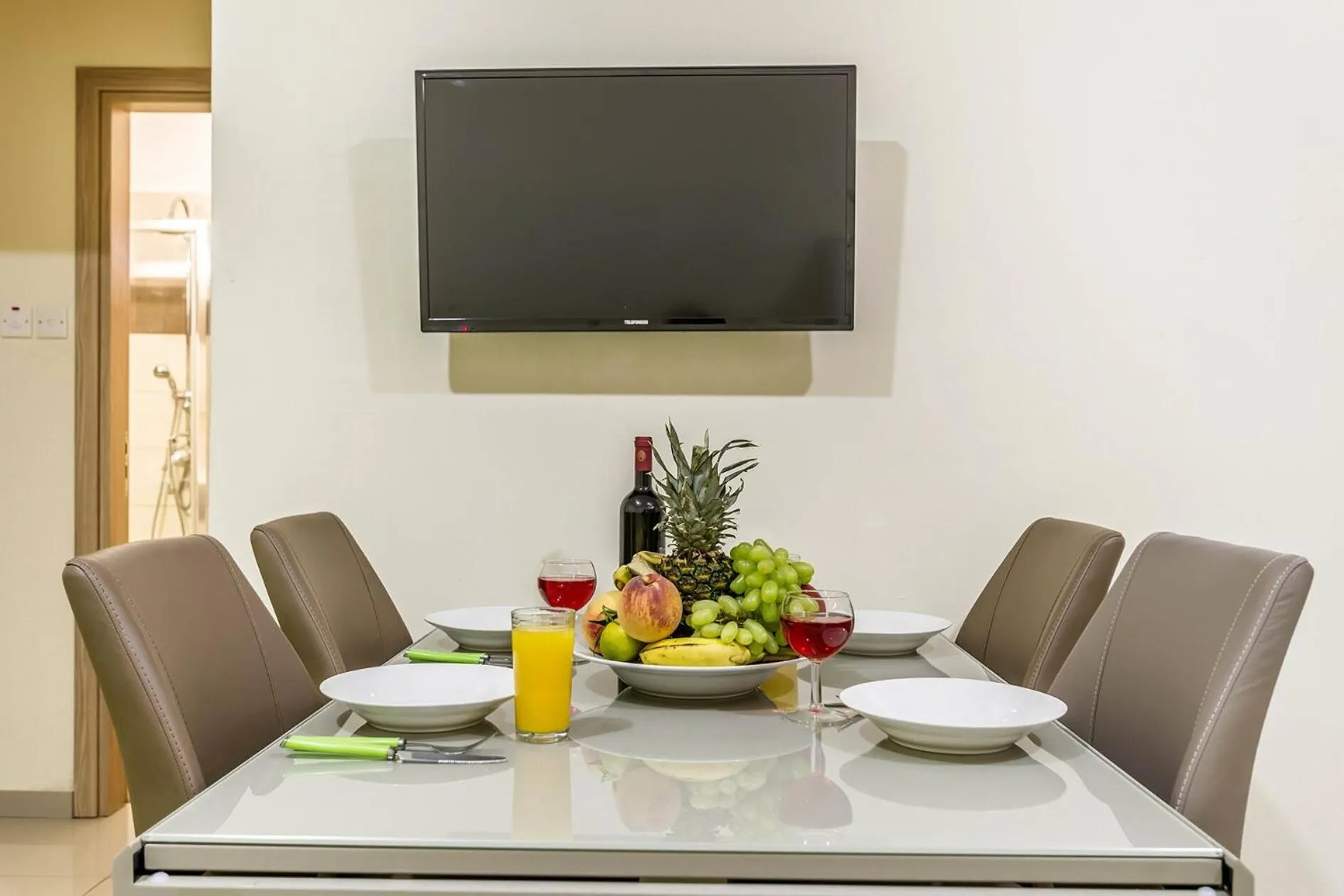 Communal lounge/ TV room in Paul Marie Hotel Apartments