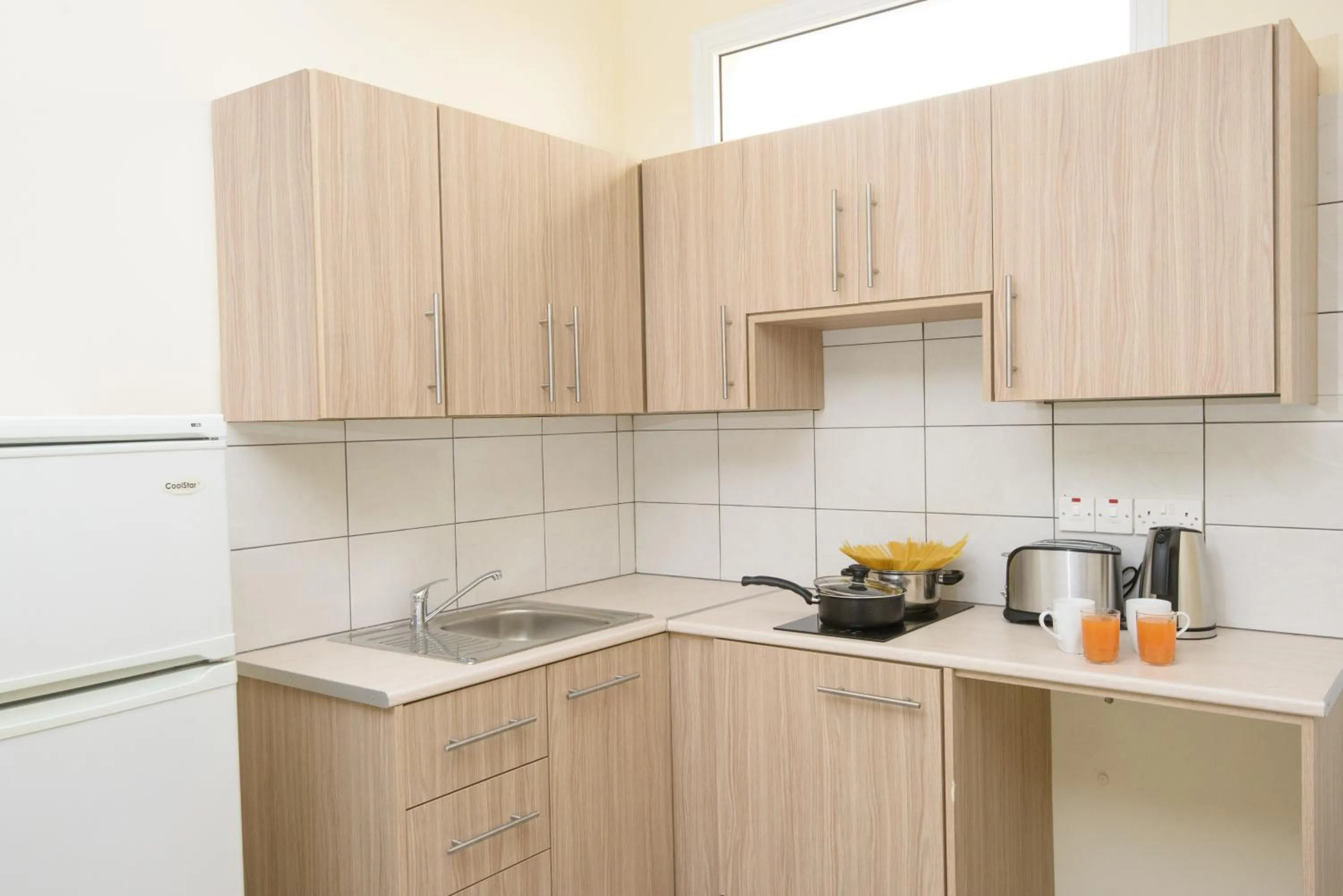 Kitchen or kitchenette in Paul Marie Hotel Apartments