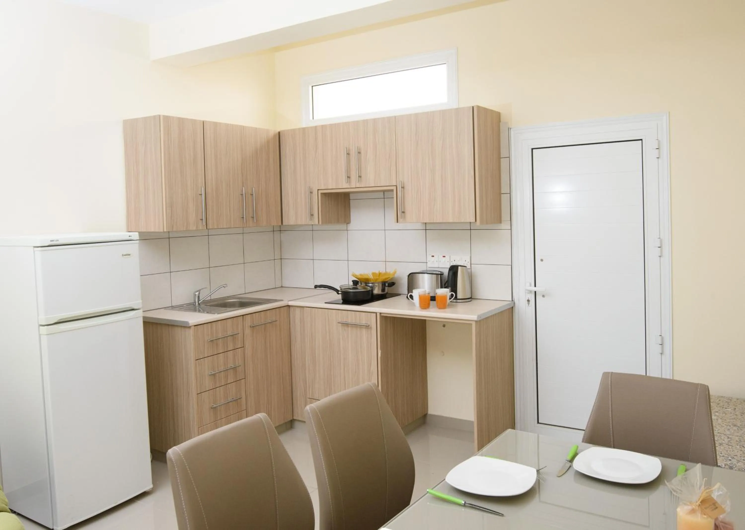 Kitchen or kitchenette in Paul Marie Hotel Apartments