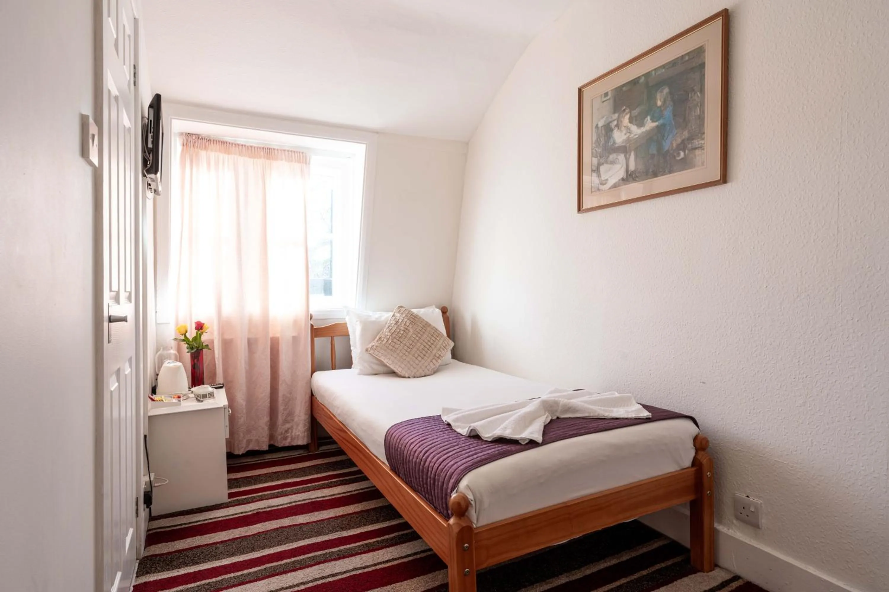 Bed in Lancaster Court Hotel