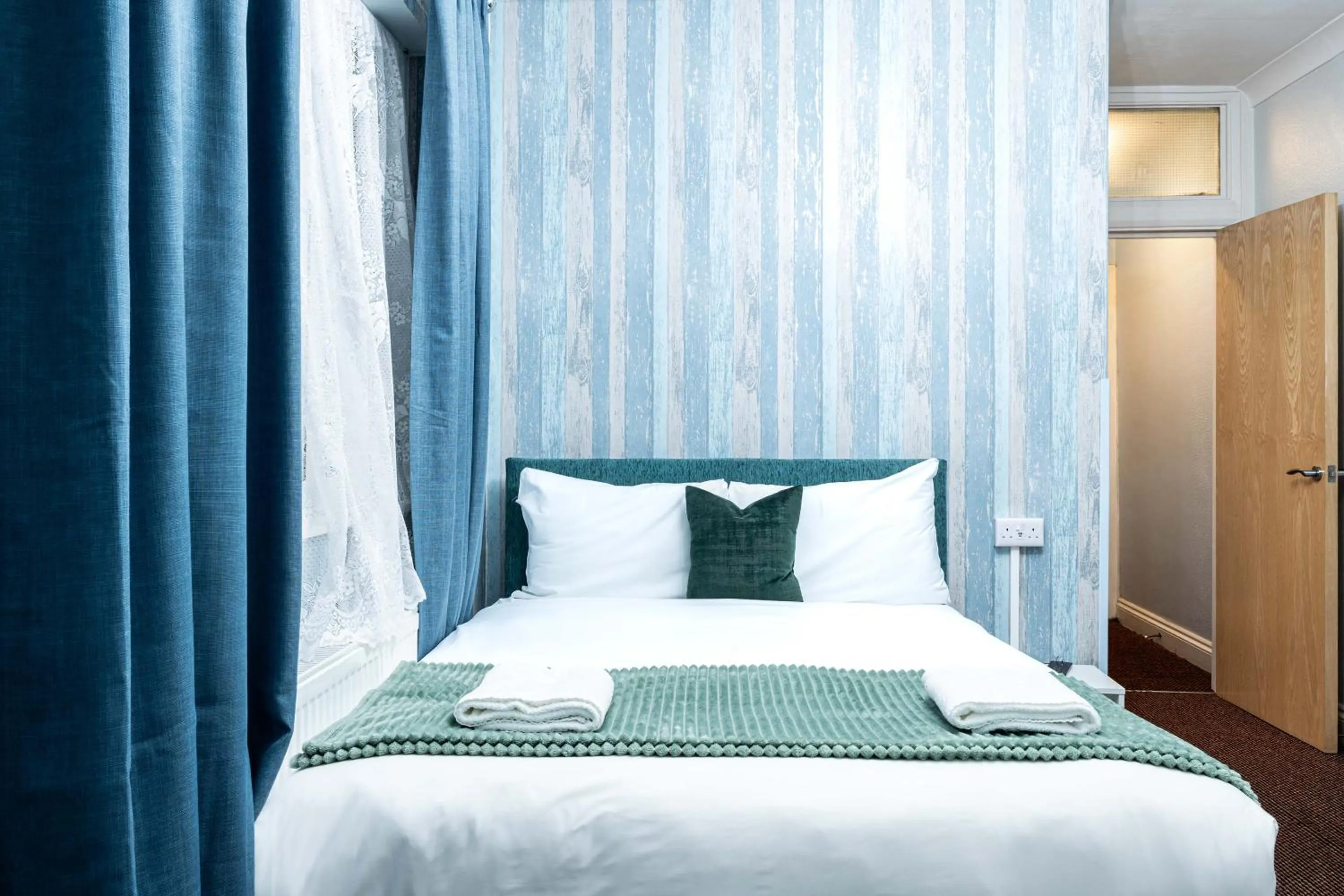 Bed in Lancaster Court Hotel