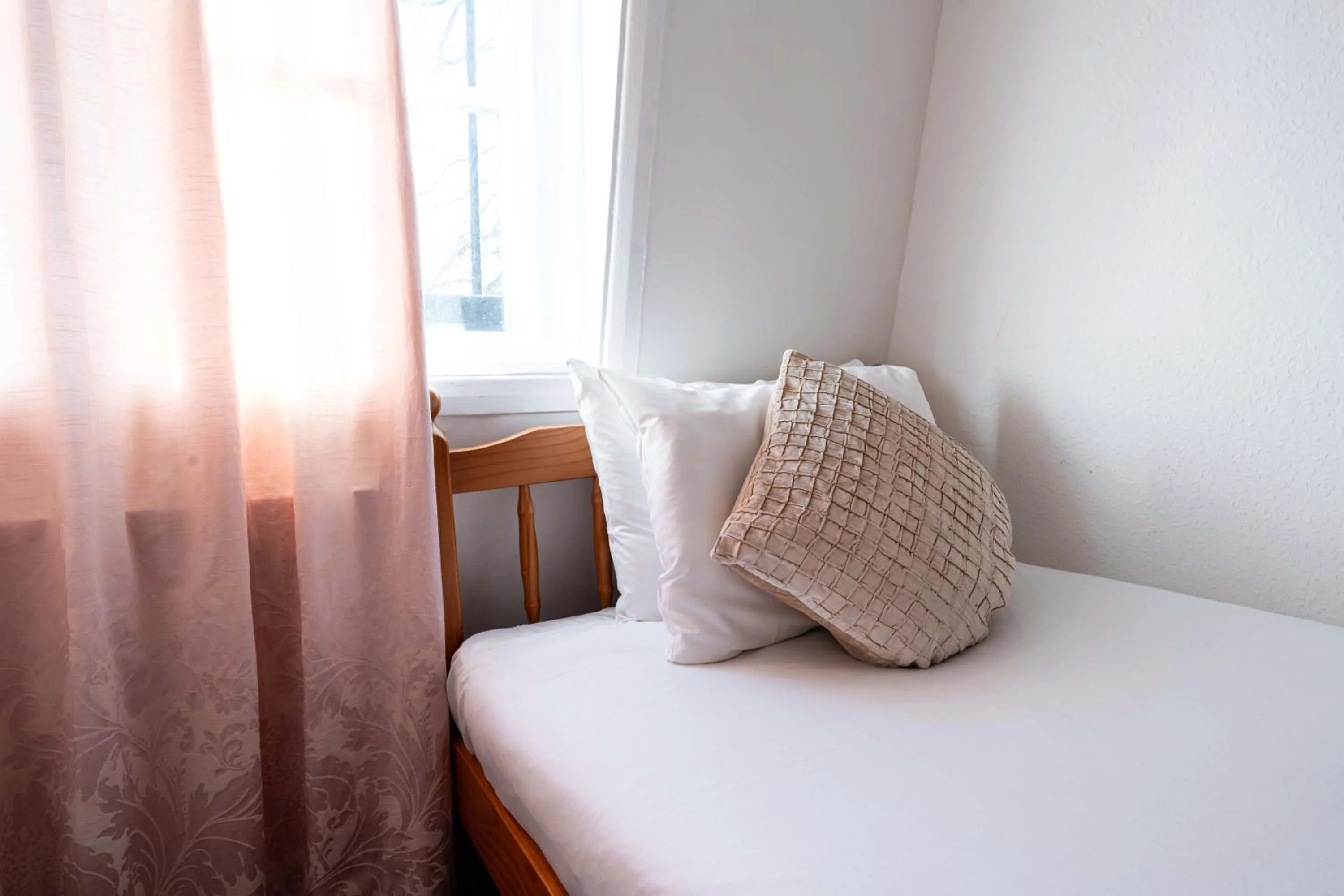 Bed in Lancaster Court Hotel