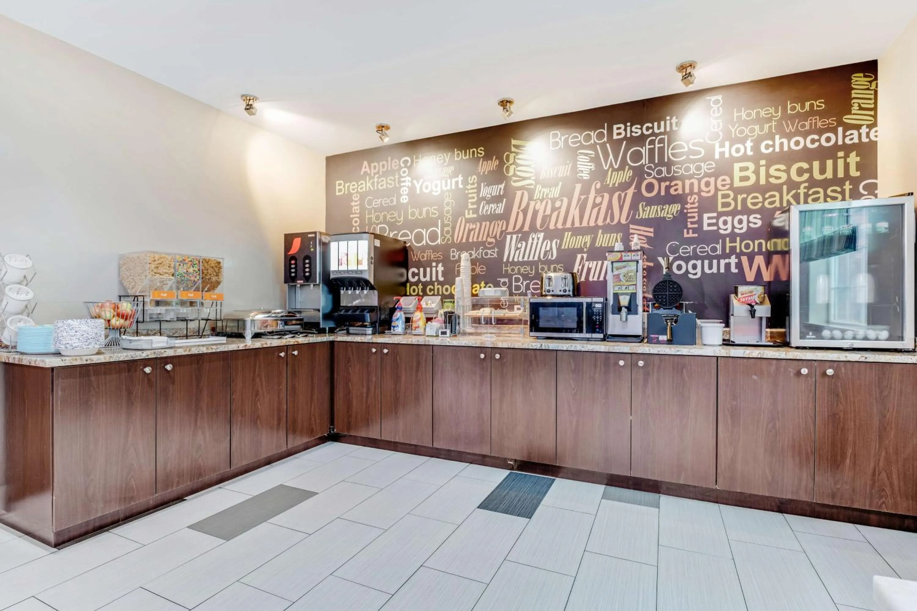 Breakfast in SureStay Plus Hotel by Best Western Owasso Tulsa North