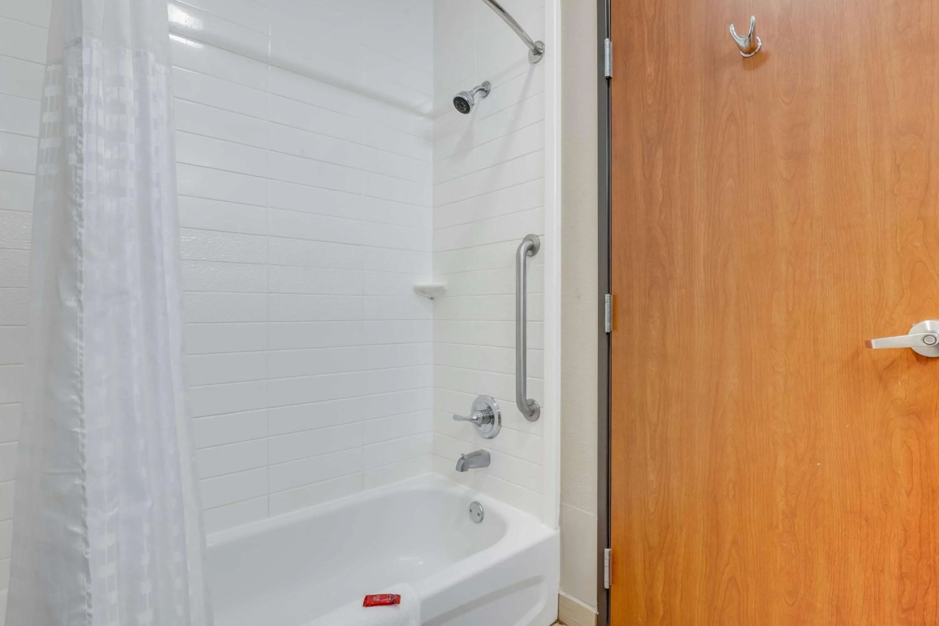 Bathroom in SureStay Plus Hotel by Best Western Owasso Tulsa North