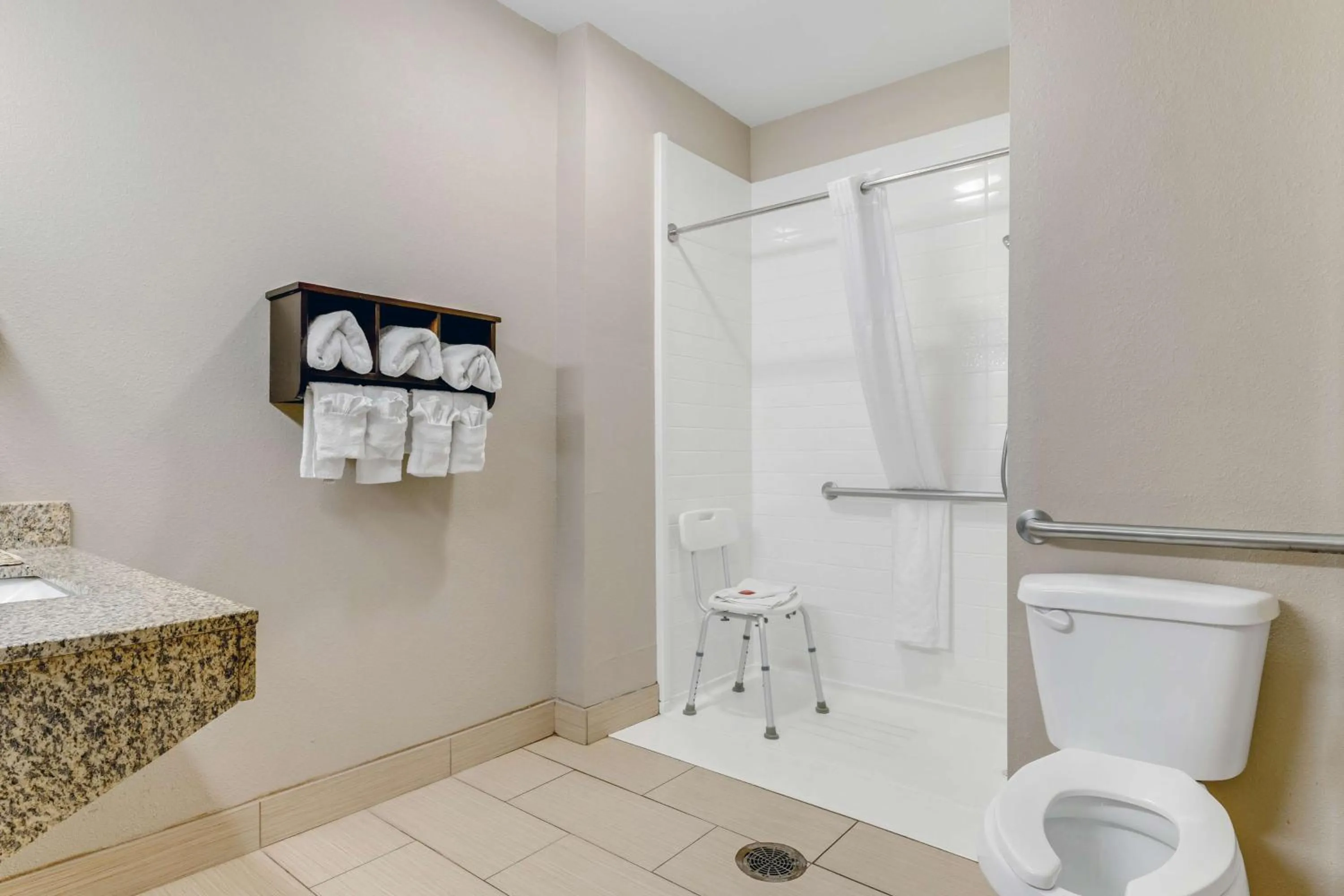 Bathroom in SureStay Plus Hotel by Best Western Owasso Tulsa North