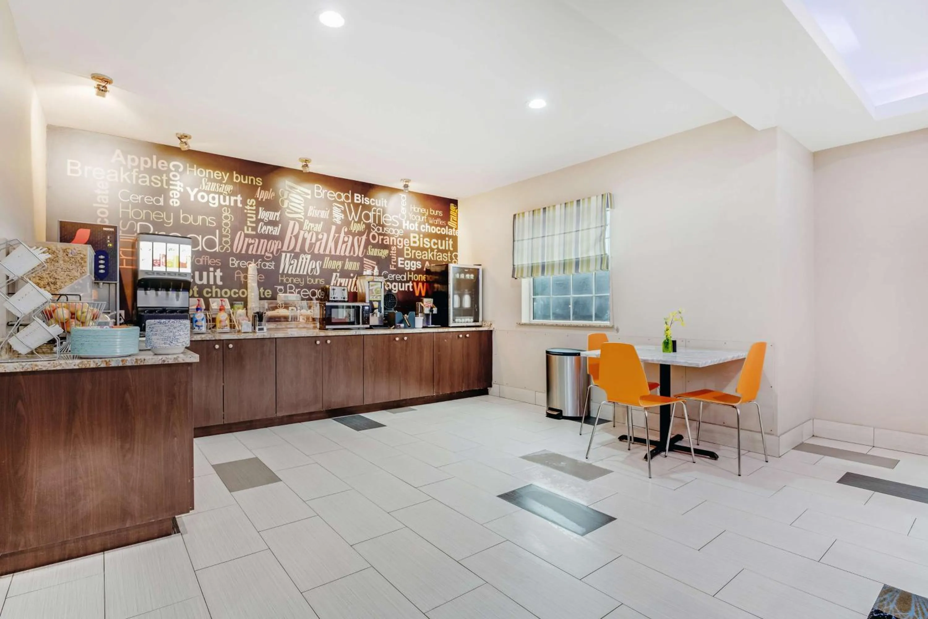 Breakfast in SureStay Plus Hotel by Best Western Owasso Tulsa North