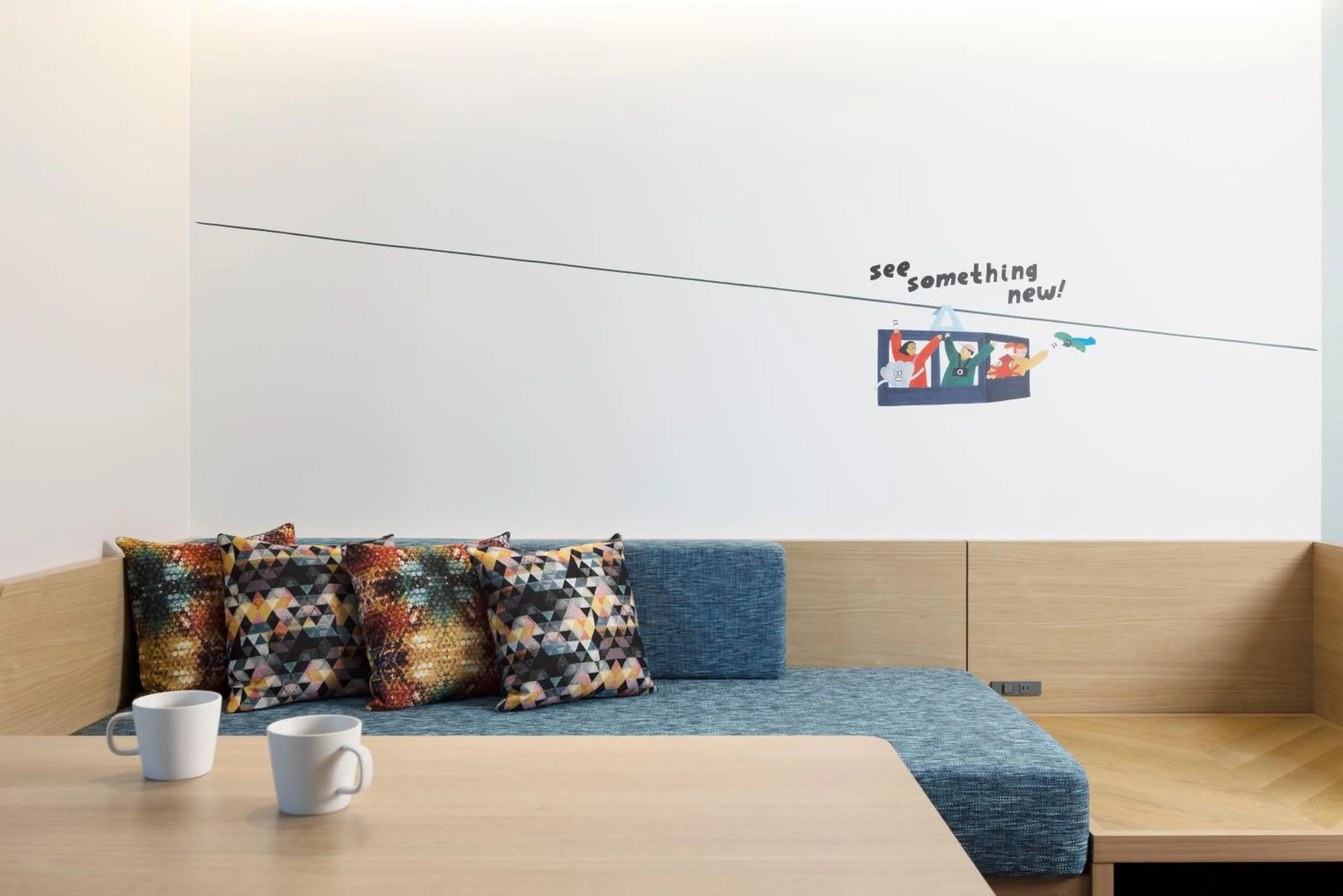 Living room in OMO5 Hakodate by Hoshino Resorts