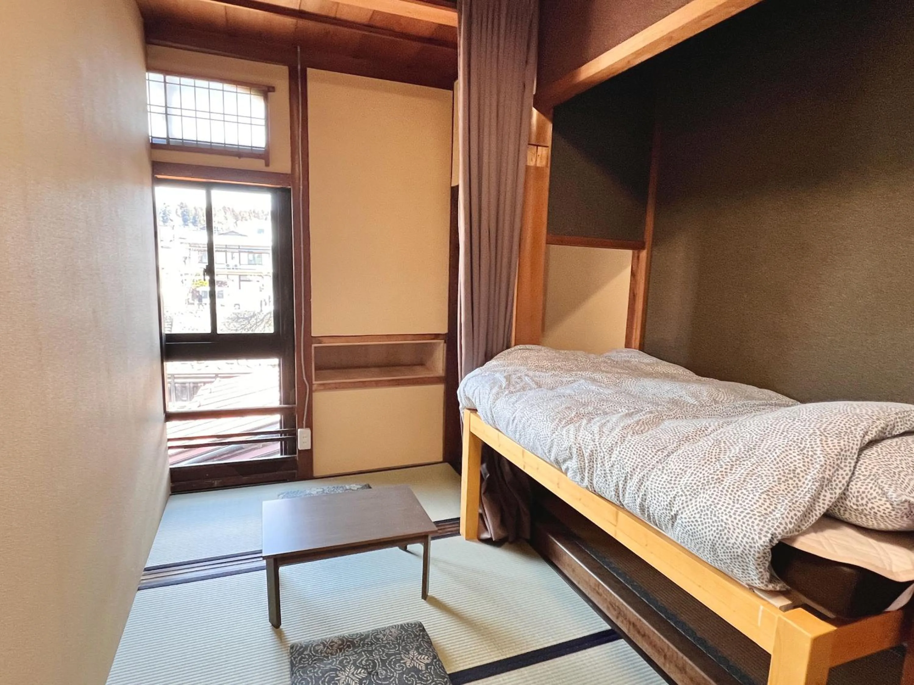 Bed in Hostel Miyagawa by Murasaki