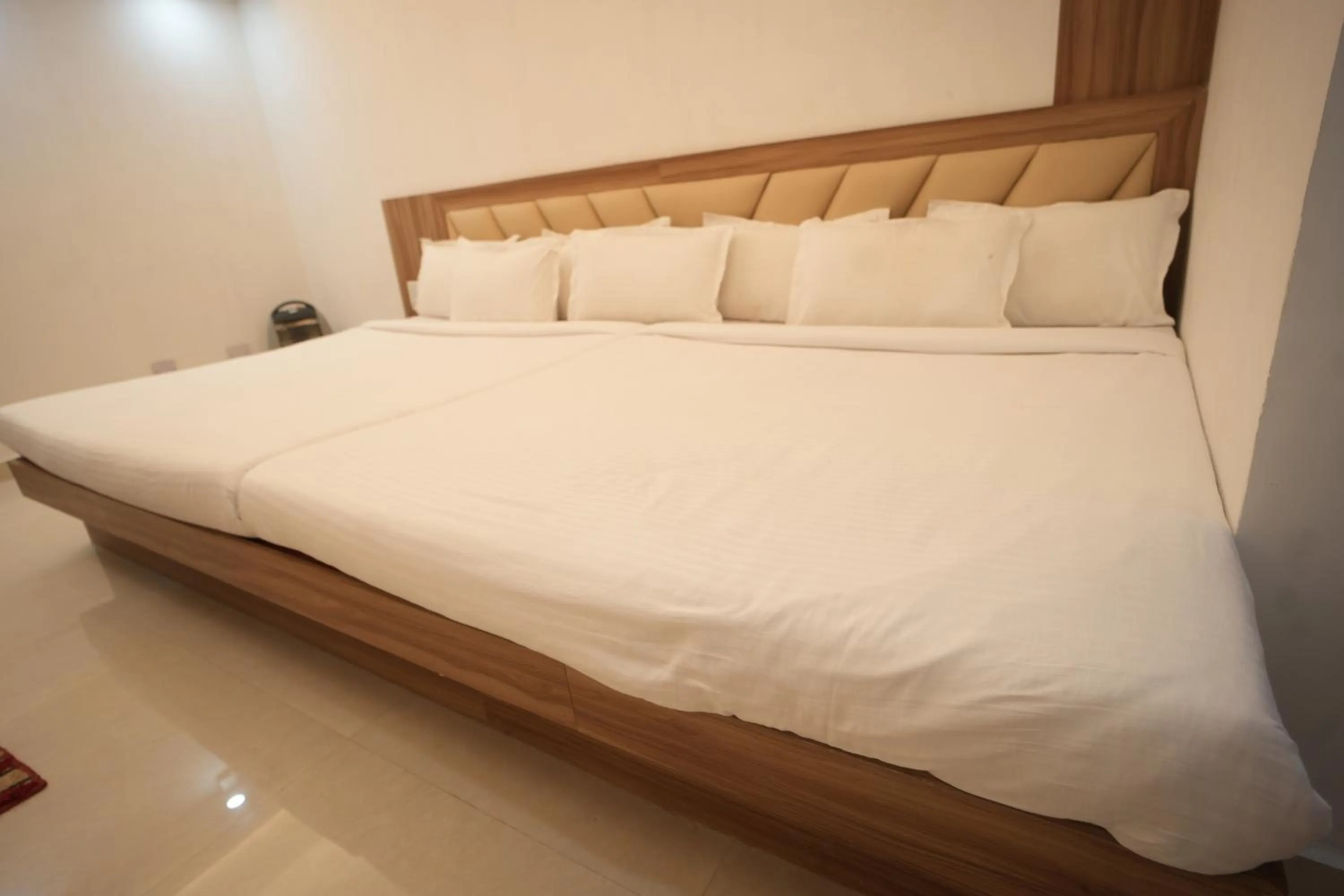 Bed in Hotel Shanti International