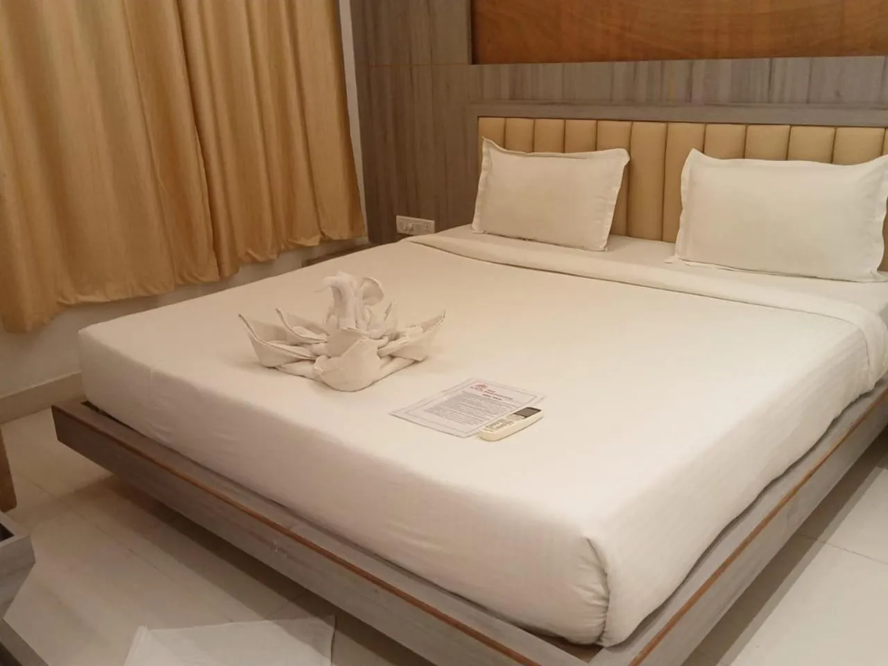 Bed in Hotel Shanti International