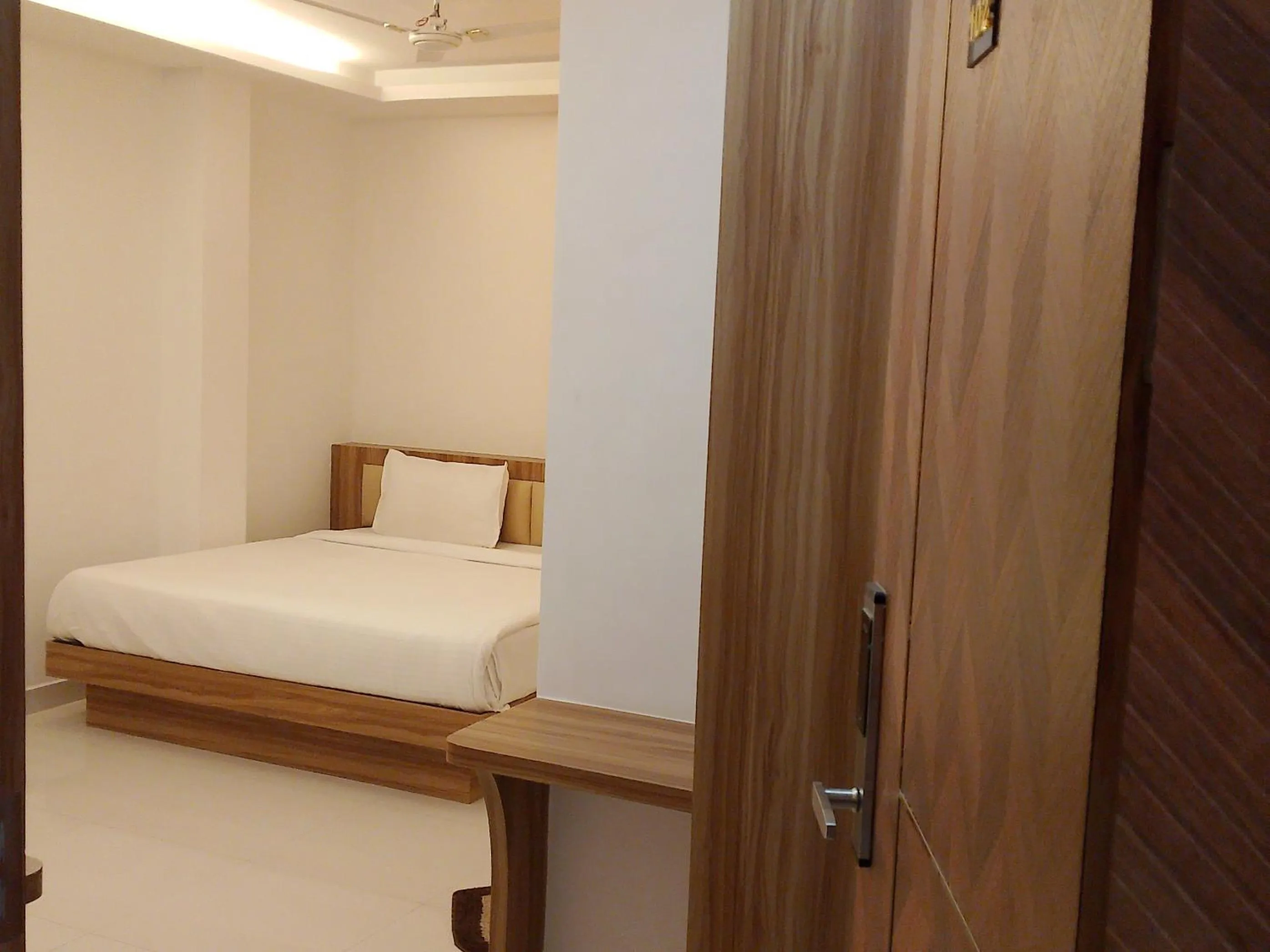 Bed in Hotel Shanti International