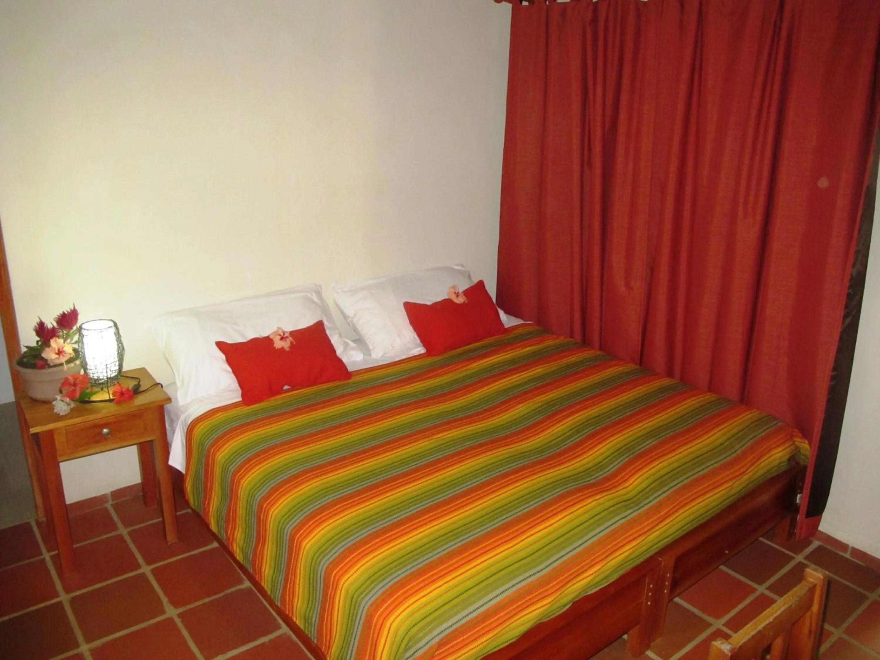 Bed in Hotel Iguanito