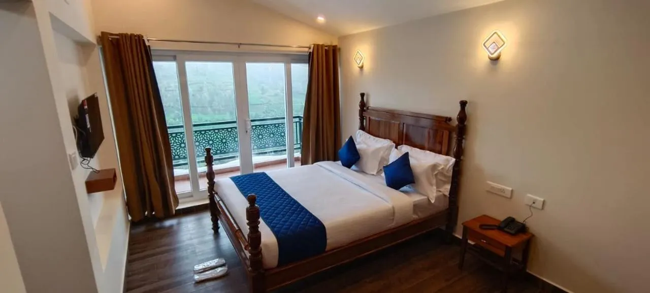 Bed in COASTAL GRAND RESORT - KOTAGIRI