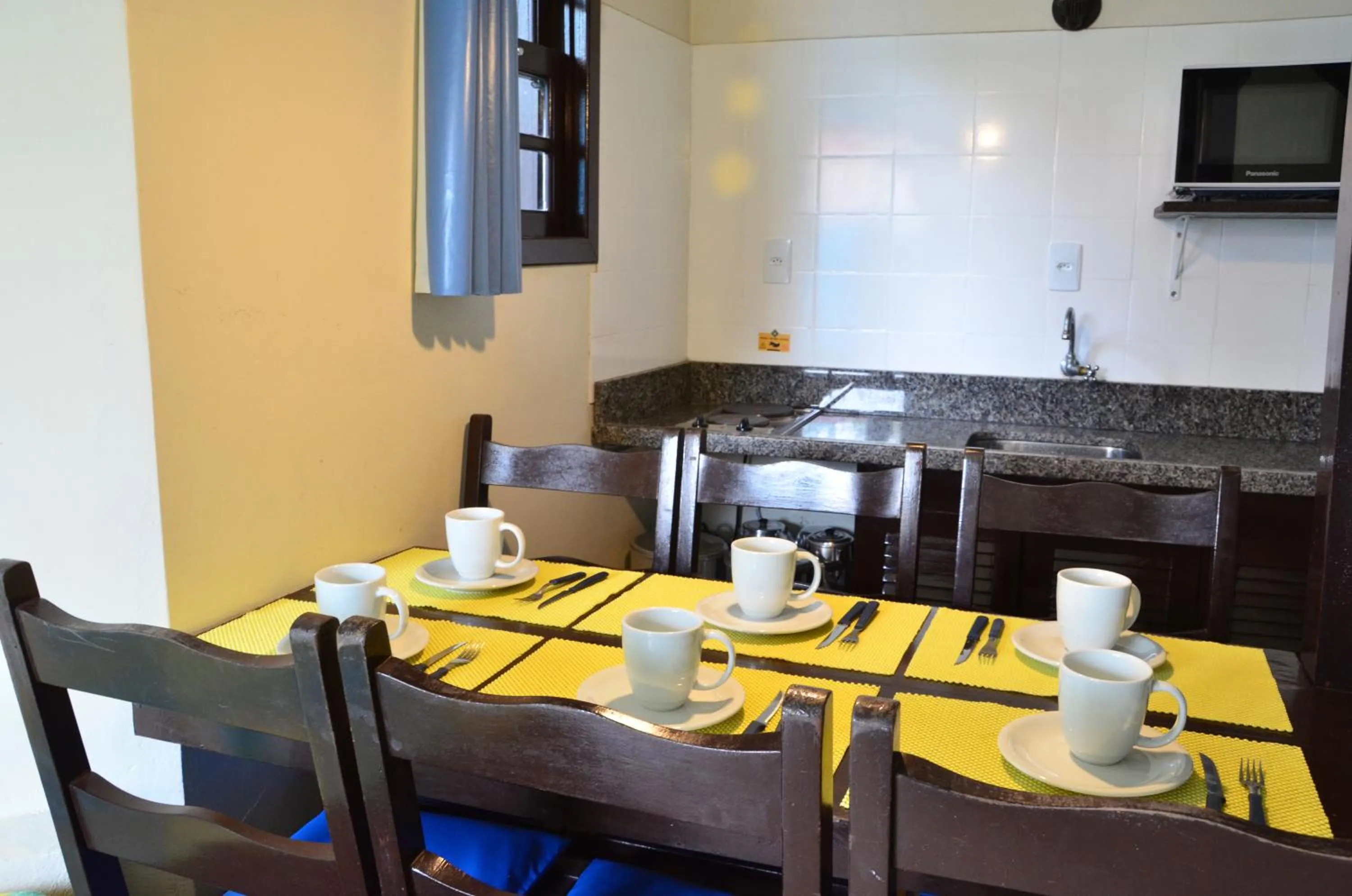 Dining area in Residencial Vila do Sol, Apartamentos com pé na areia