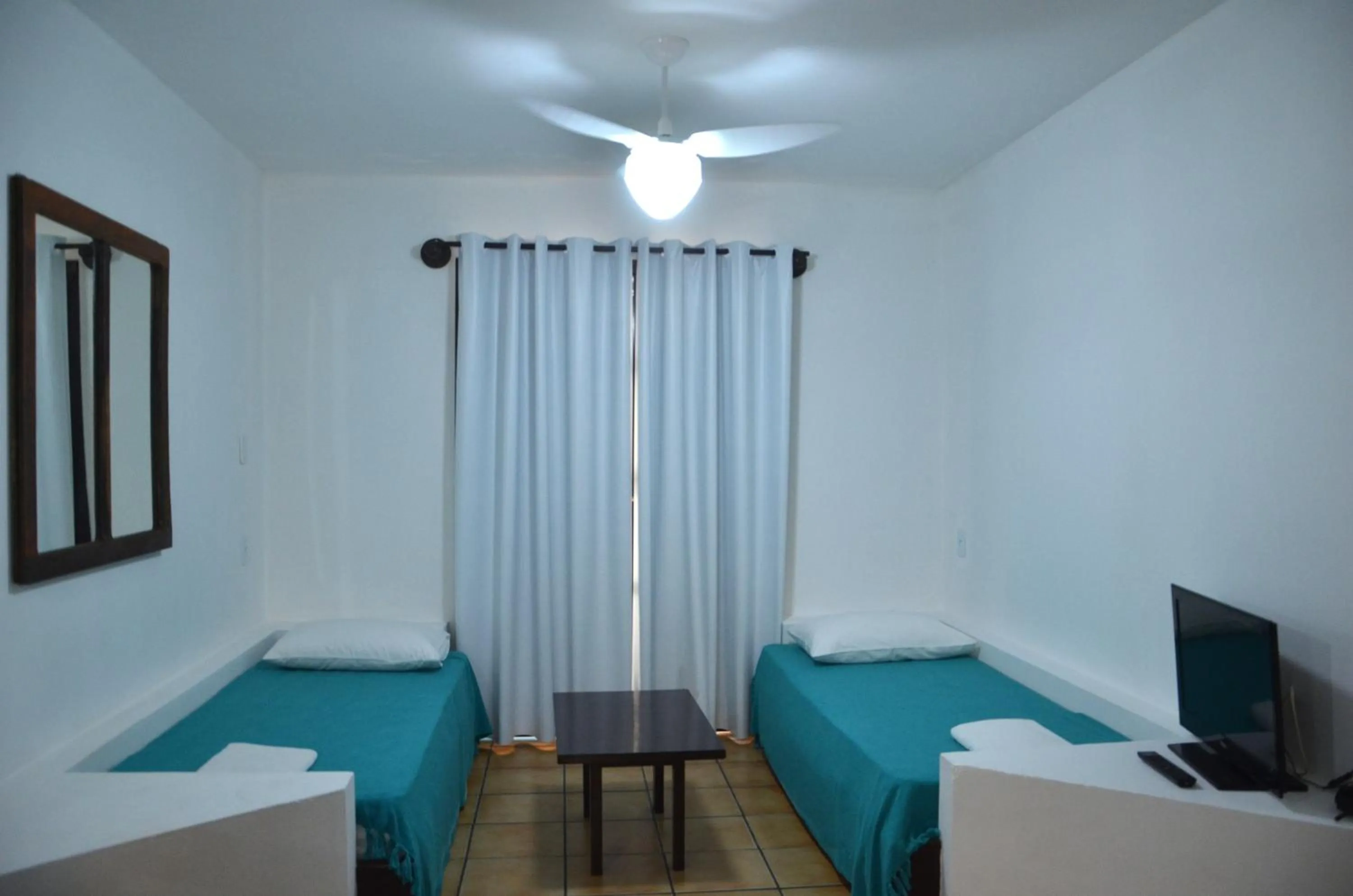 Living room, Bed in Residencial Vila do Sol, Apartamentos com pé na areia