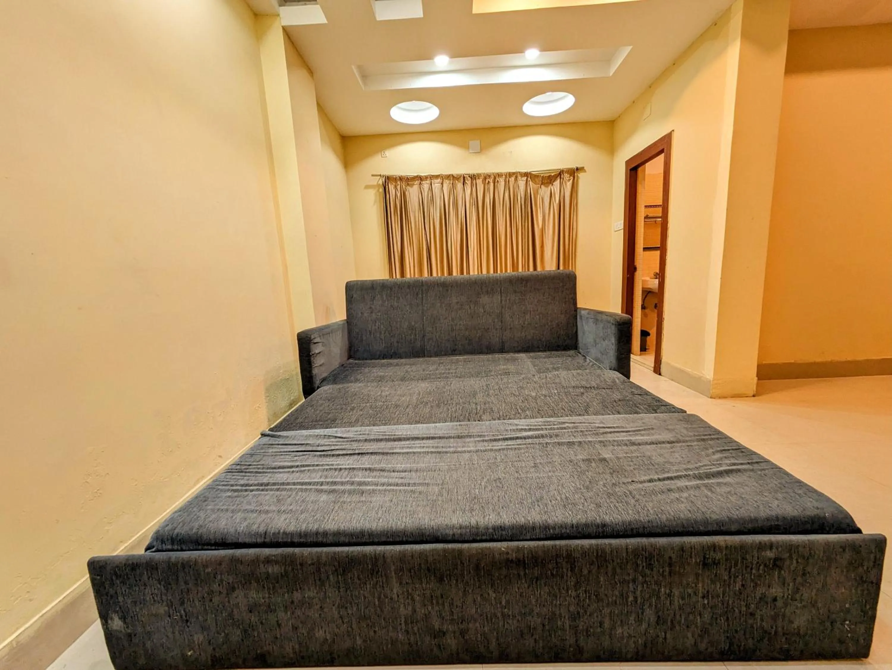 Seating area, Bed in HOTEL SUN CITY
