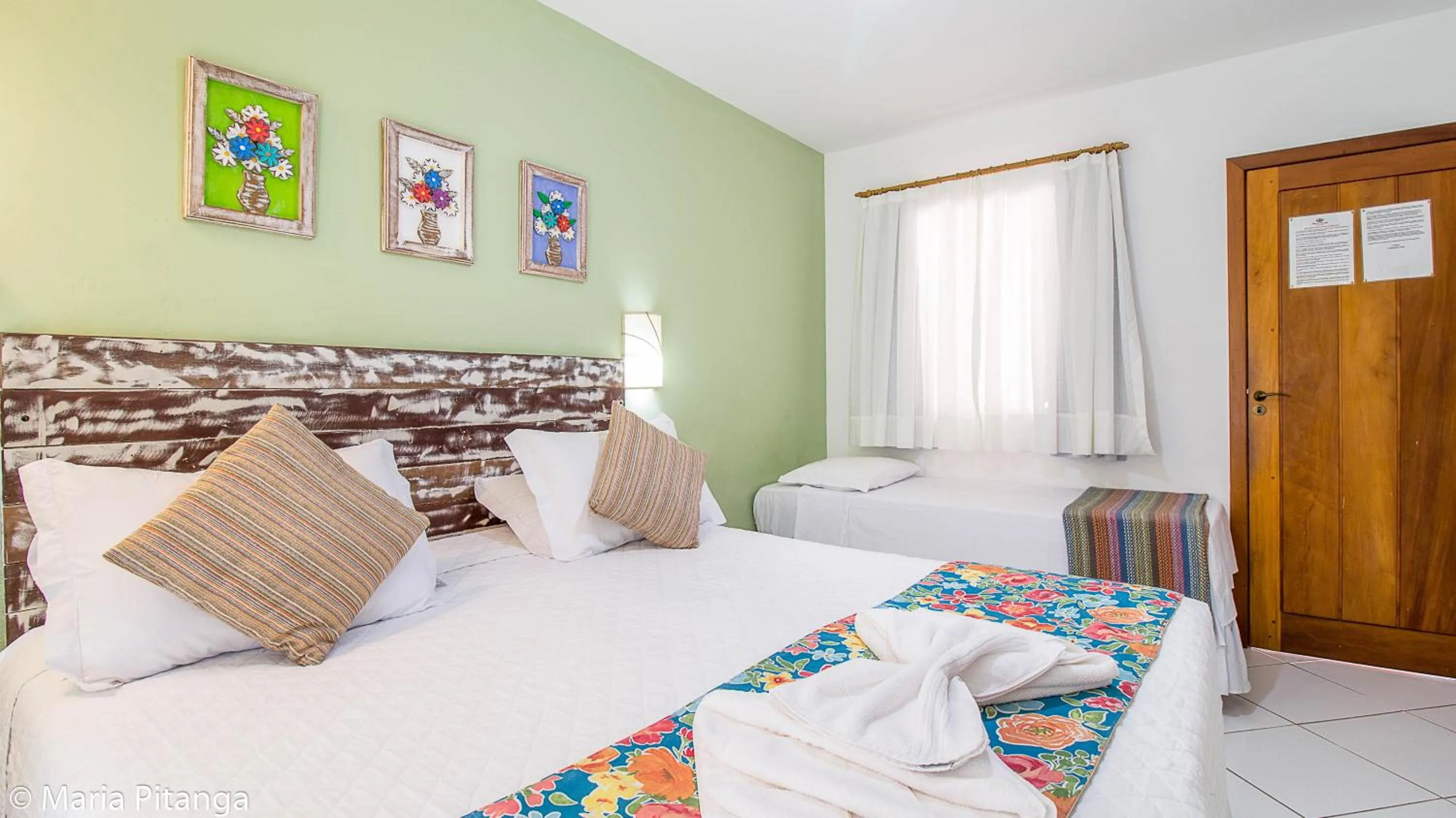 Bed in Pousada Maria Pitanga