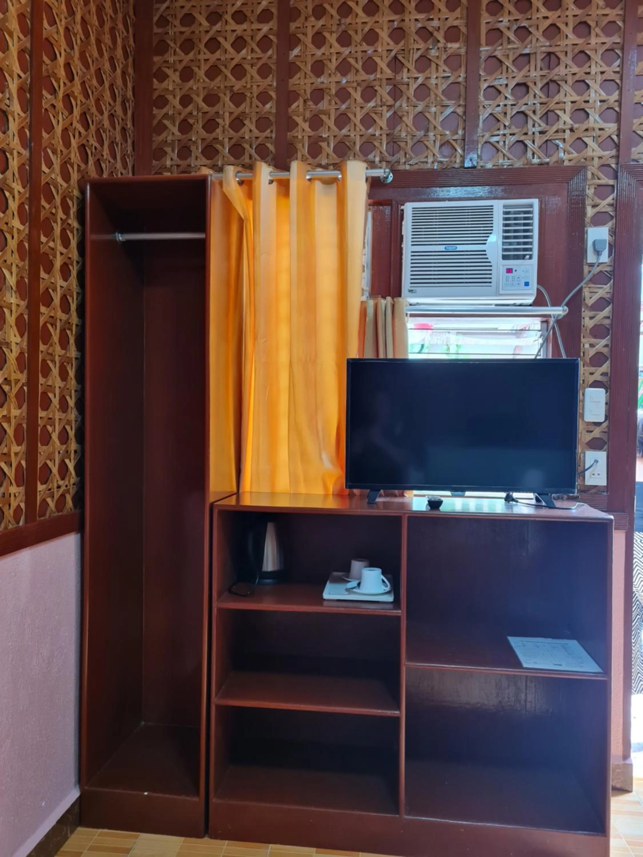 TV and multimedia in Alona Hidden Dream Resort by SMS Hospitality