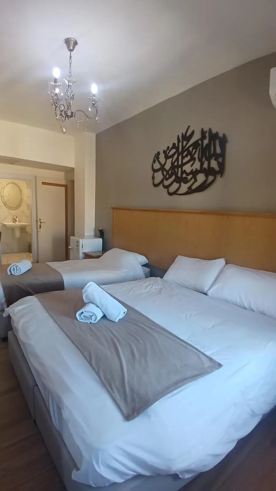 Bed in Moab Land Hotel