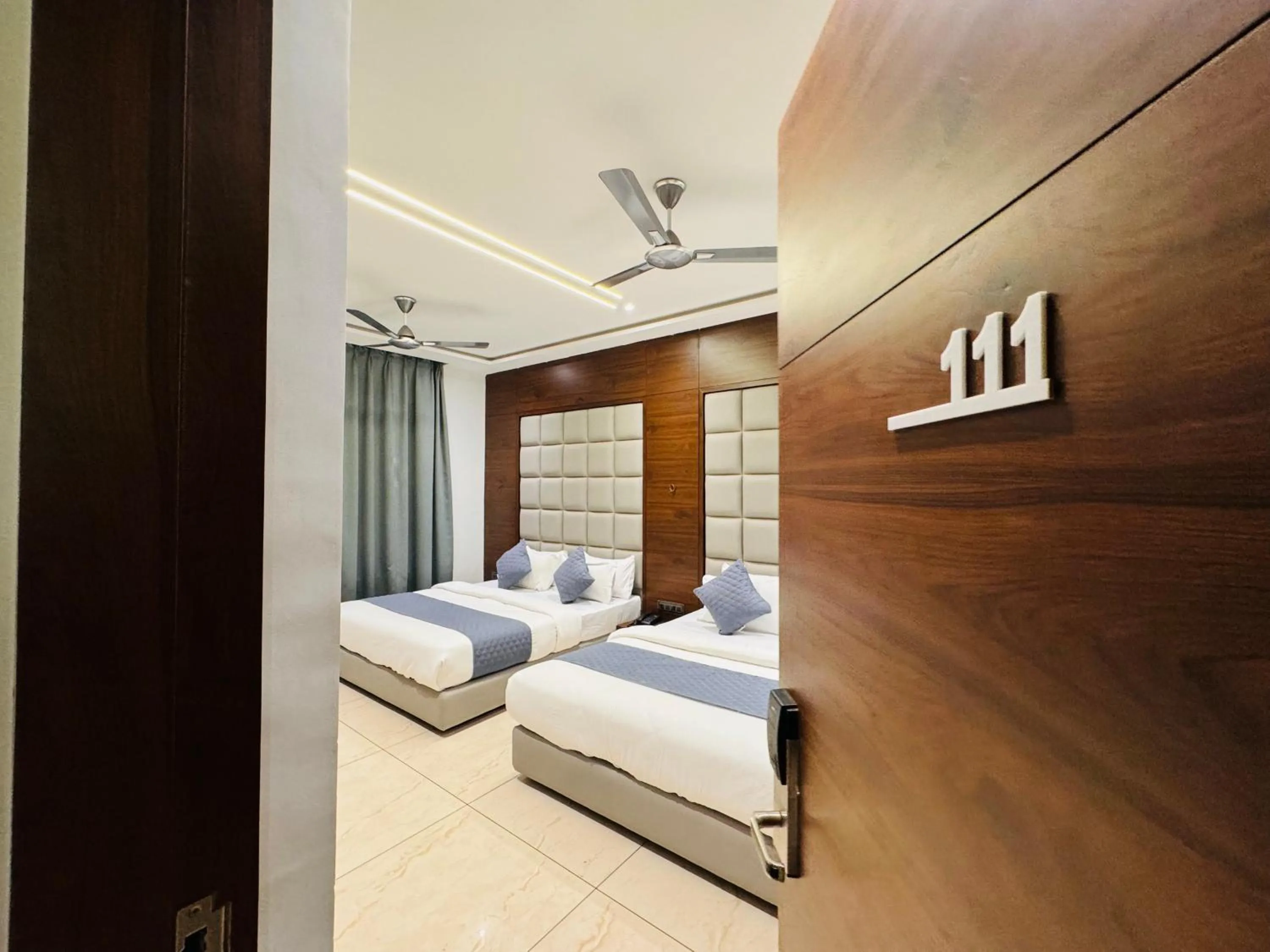 Photo of the whole room, Bed in Hotel Rajdev INN