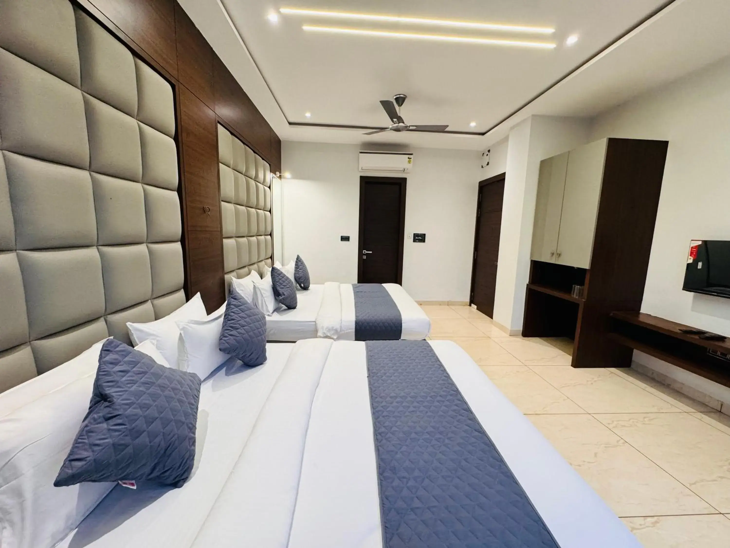 Photo of the whole room, Bed in Hotel Rajdev INN Photo of the whole room, Bed in Hotel Rajdev INN