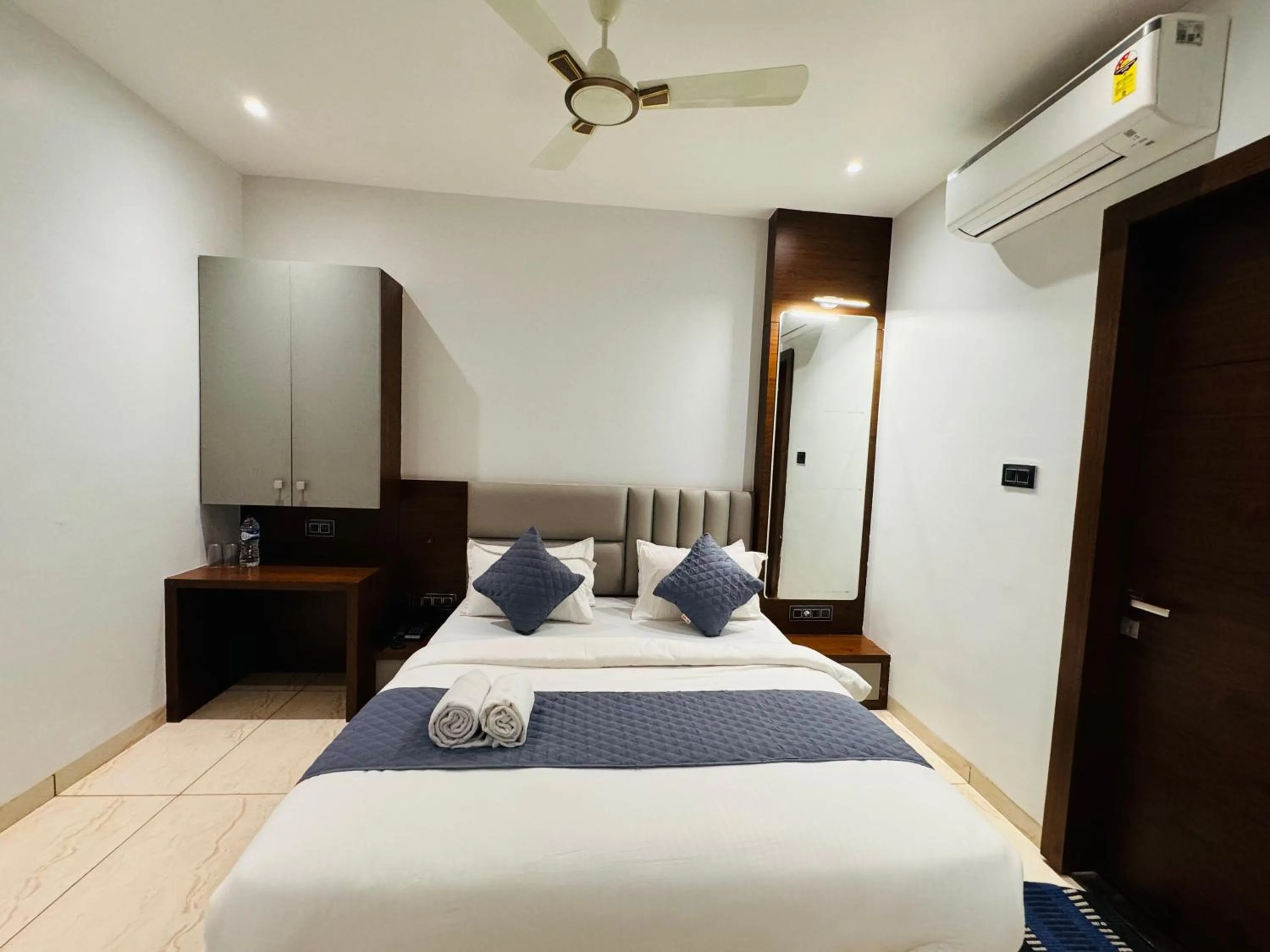 Photo of the whole room, Bed in Hotel Rajdev INN