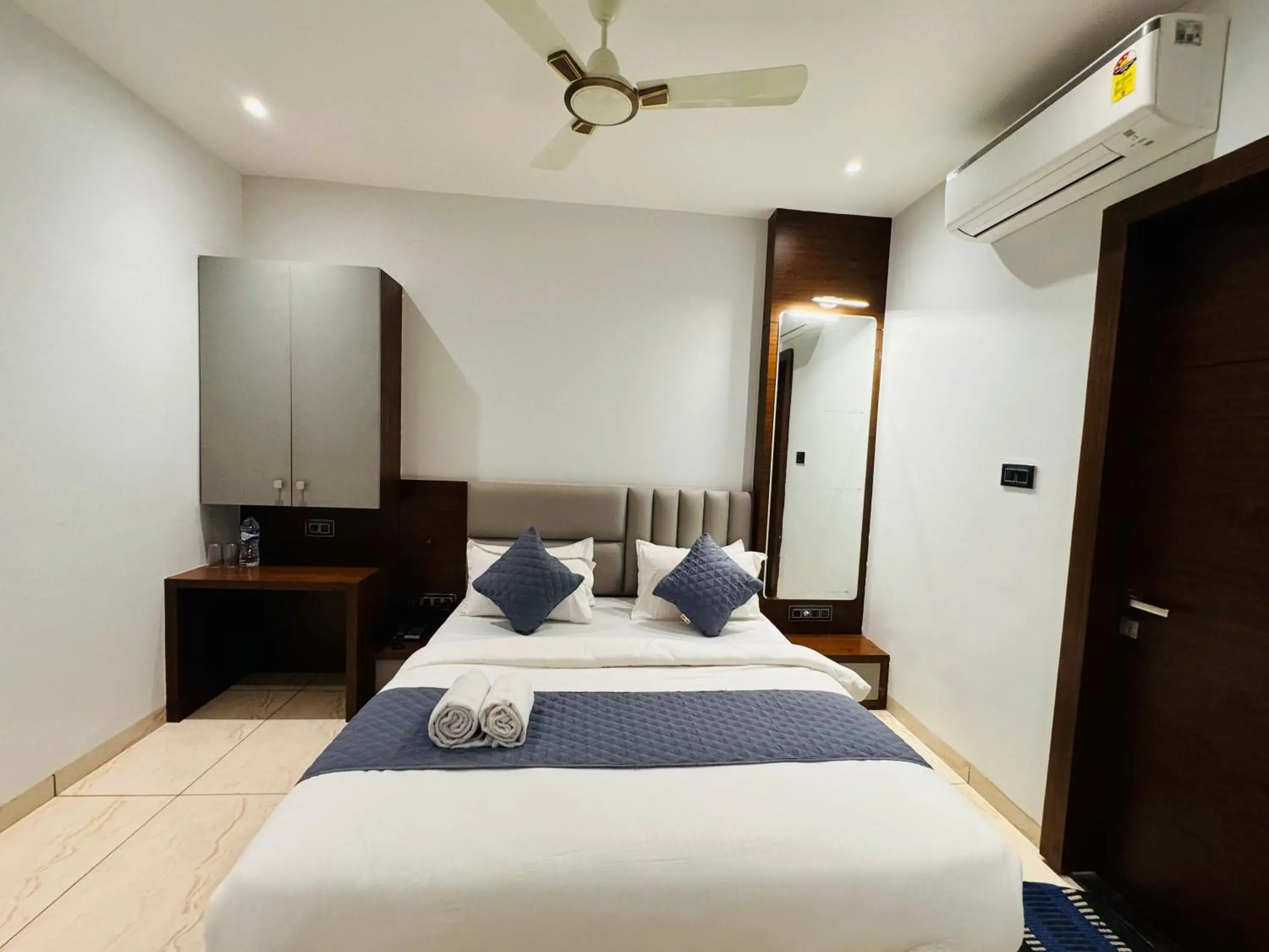 Photo of the whole room, Bed in Hotel Rajdev INN Photo of the whole room, Bed in Hotel Rajdev INN