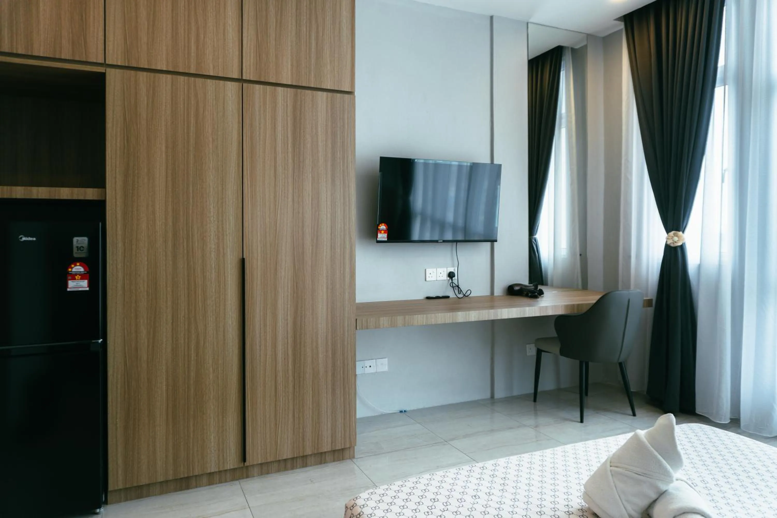 Photo of the whole room, Bed in Suites Homestay by Evernent