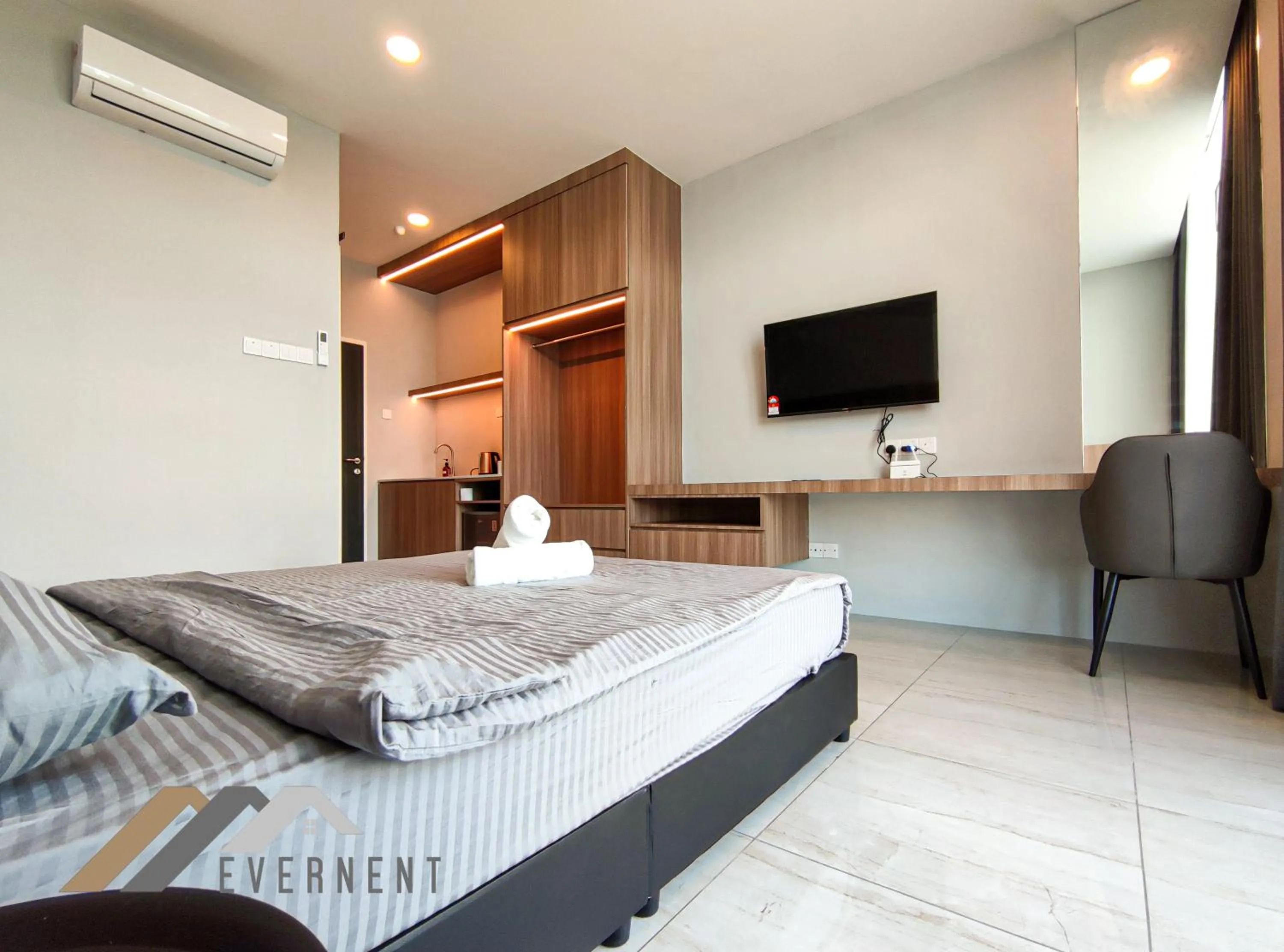 Photo of the whole room, Bed in Suites Homestay by Evernent