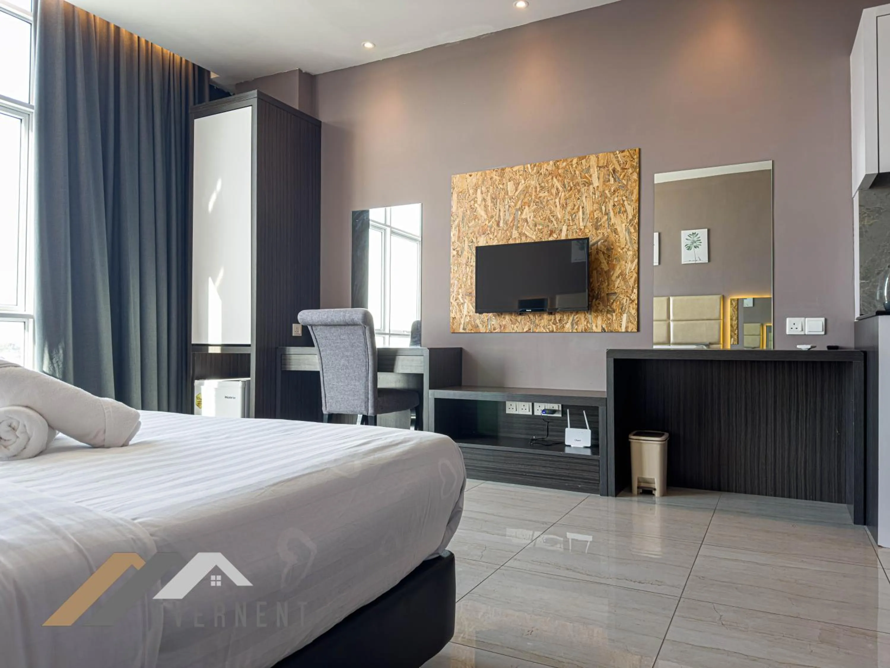 Bed in Suites Homestay by Evernent