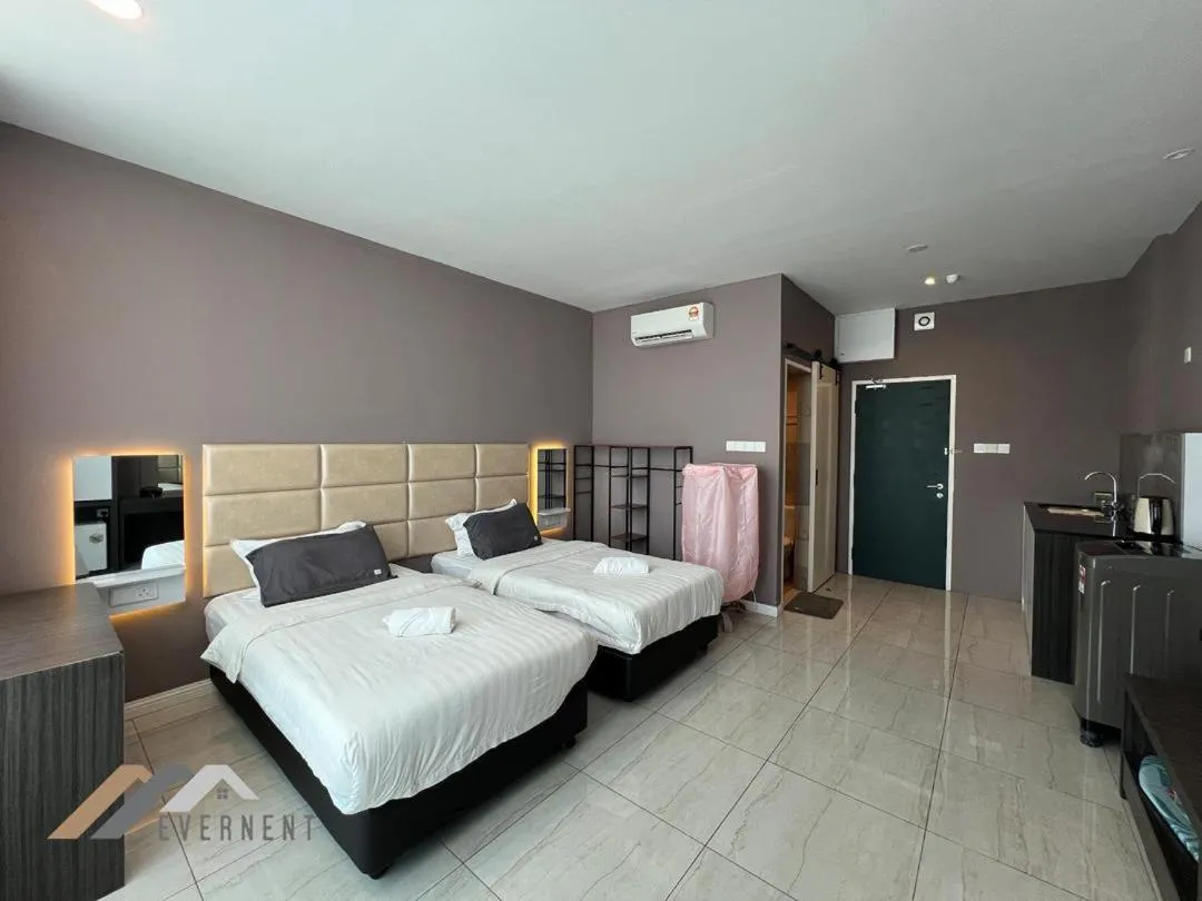 Photo of the whole room, Bed in Suites Homestay by Evernent
